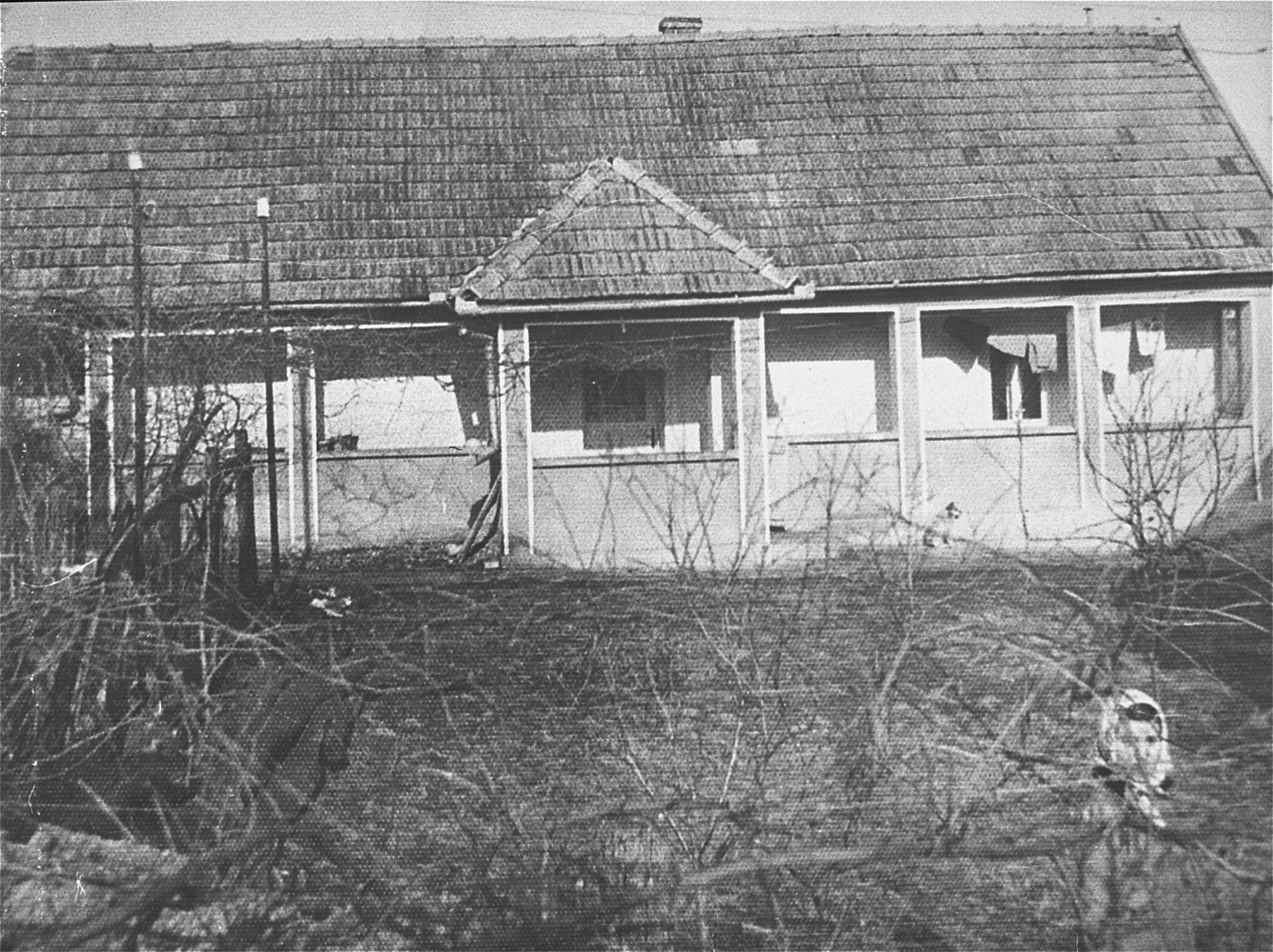 A house in Sarmas in which Romanians and Jews were tortured by Hungarians during the Sarmas pogrom.

Sarmas, located in Transylvania along the Hungarian border, had a Jewish population of only 126 in 1944.  When the Hungarian Army occupied Sarmas on 5 September 1944, the population of the town pillaged all the Romanian and Jewish homes in Sarmas.  On September 8th, the Jews were ordered to mark their homes with a yellow Star of David, whereafter they were rounded-up by Hungarian peasants from the town.  The Jews were taken to the courtyard of a Romanian construction foreman, beaten severely, and then forced to work.  On September 16th, 20 Jewish men were selected to dig mass graves.  That evening, the 126 Jews of Sarmas were killed and buried.