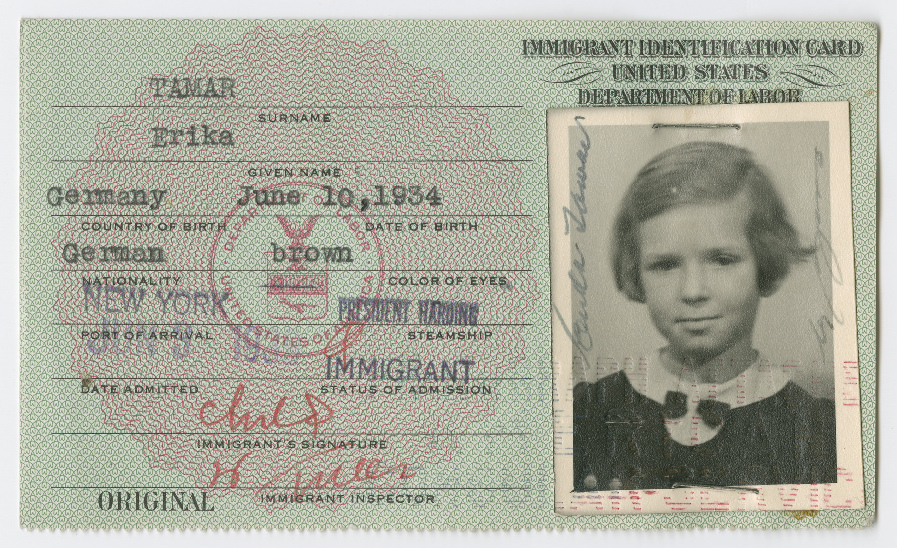 United States Immigrant Identification Card issued to Erika Tamar.

It states she was born in Germany though she was born in Vienna.