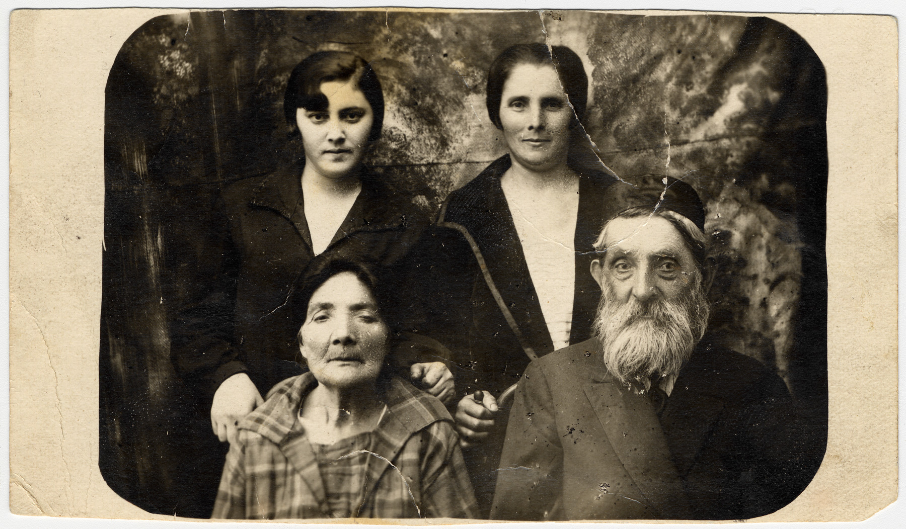 Studio portrait of three generations of the Nudelman Cycelman family.

Pictured are Slava Nudelman and third husband, Sonja Cygelman and Rachel Nudelman Cygelman.  Rachel is Slava's daughter and Sonja's mother.