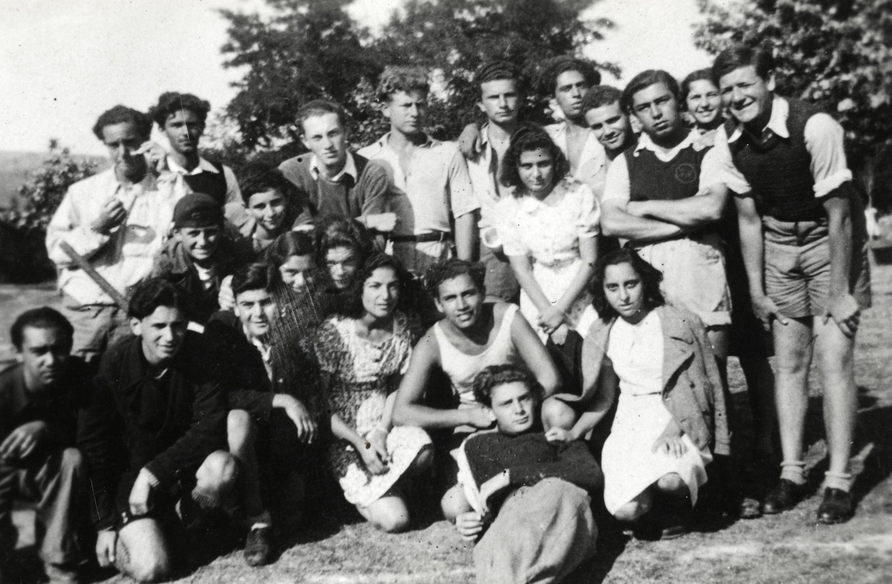 Group portrait of members of the Betar Zionist youth group in a summer camp near Sofia.

Joseph is pictured third from the left in the front row.