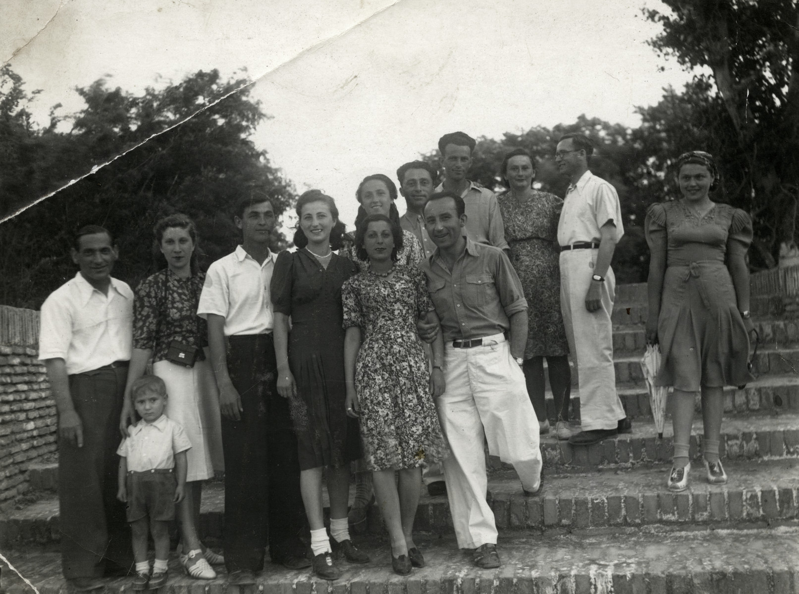 Polish Jewish refugees in Bukhara pose for a group photograph while on an outing.

Jonas, Benjamin and Rywka Markowicz are on the left.