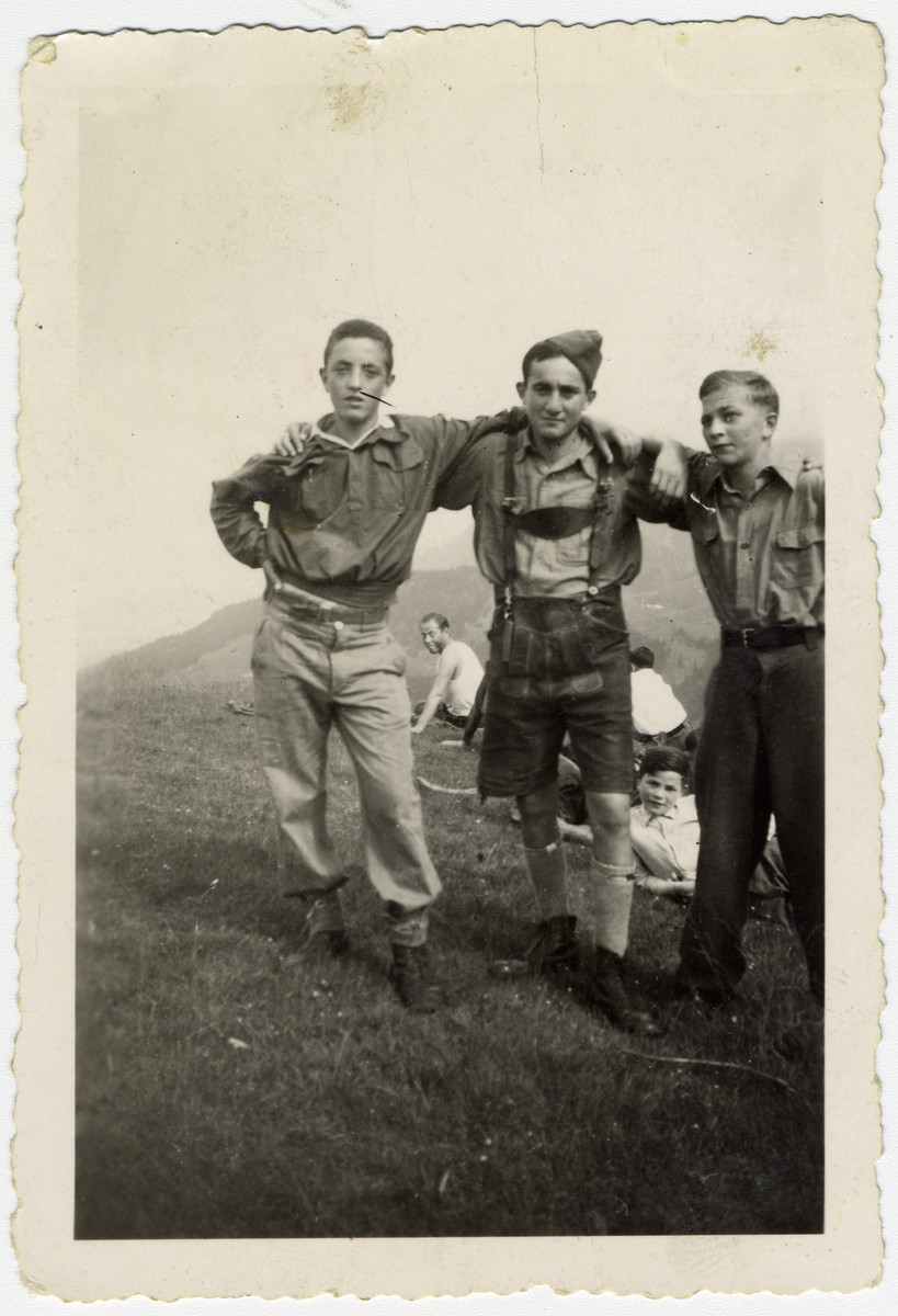 Group portrait of three "Buchenwald Boys", teenage survivors of Buchenwald, in a children's home in Switzerland.

Pictured left to right are Murray Goldfinger, Stanley Appel and Henry Kolber.