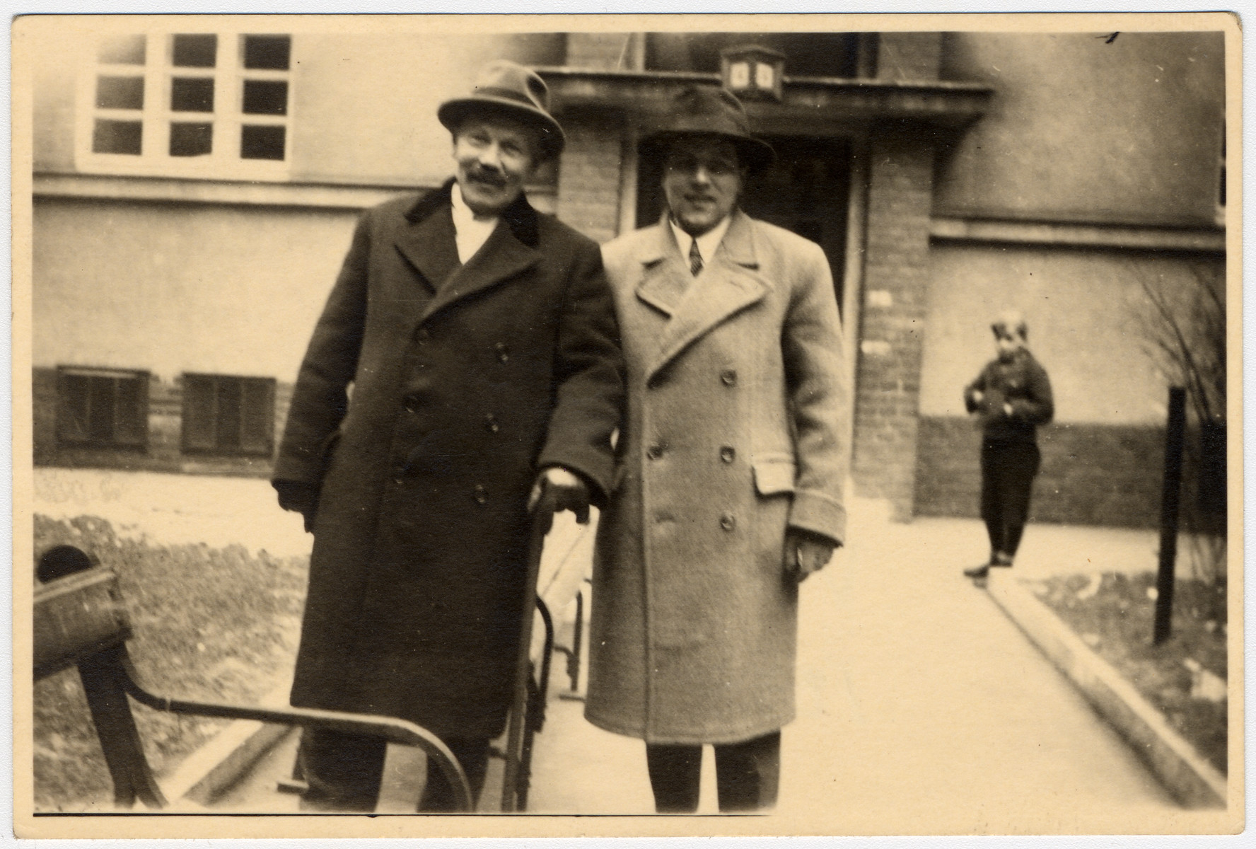 Portrait of Markus Bernfeld and his son Josef (relatives of the donor) outside a building in Vienna.

Both men perished during the Holocaust.