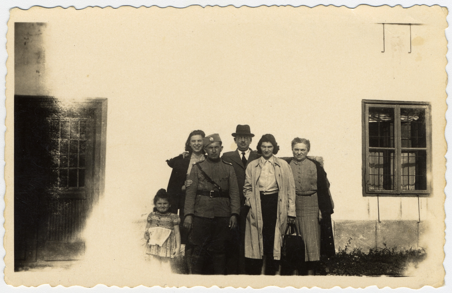 The Willer poses together about a year prior to the invasion of Yugoslavia.

Pictured from left to right are Rina Willer, Claudia Juhn, Andor Willer (wearing army uniform), Benjamin Schlesinger, Marta Willer and Elsa Schlesinger.