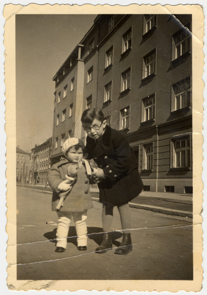 Rina and her cousin Reuven Stein pose on a street in Zagreb.

Reuven was the son of Ella Willer. He perished a few years later in Auschwitz.