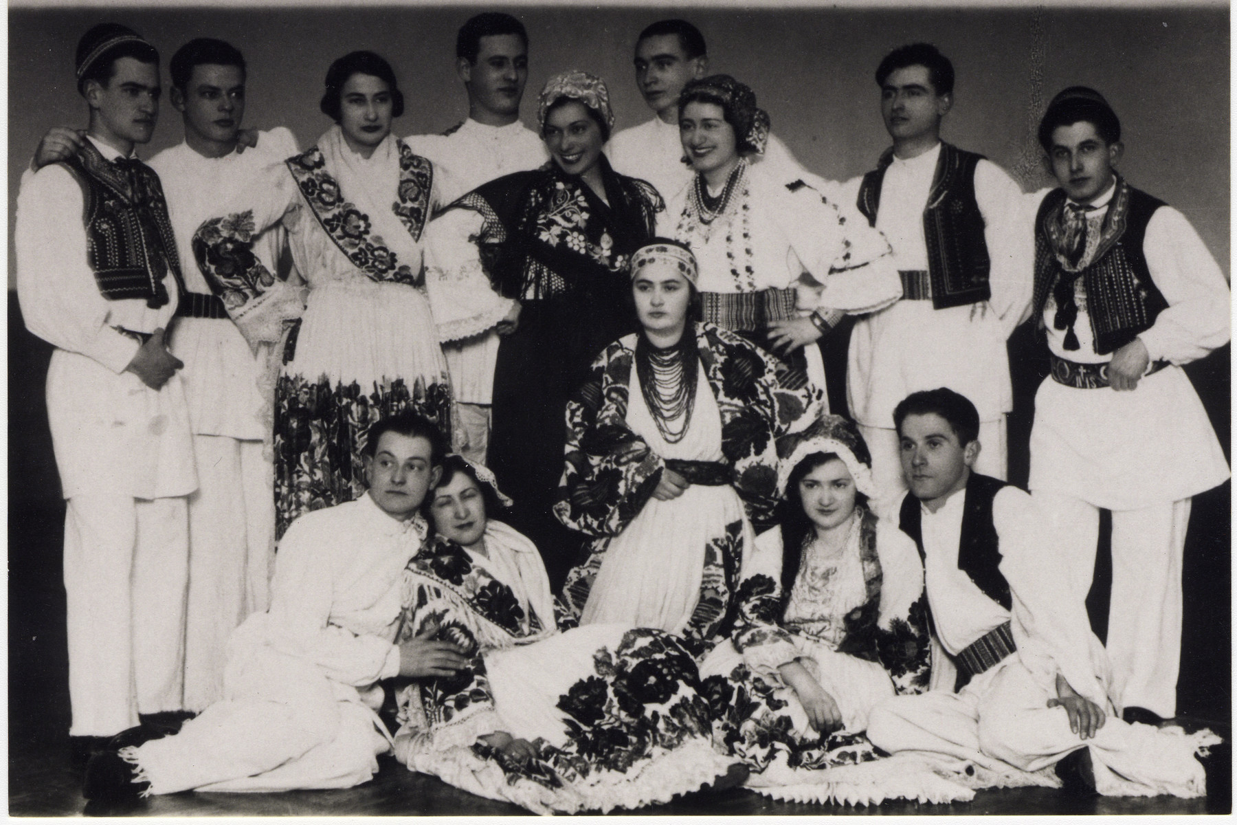 The Yugoslav team at the Maccabi games in Palestine poses in traditional folk costumes.

Andor Willer, a member of the fencing team, stands on the far right.