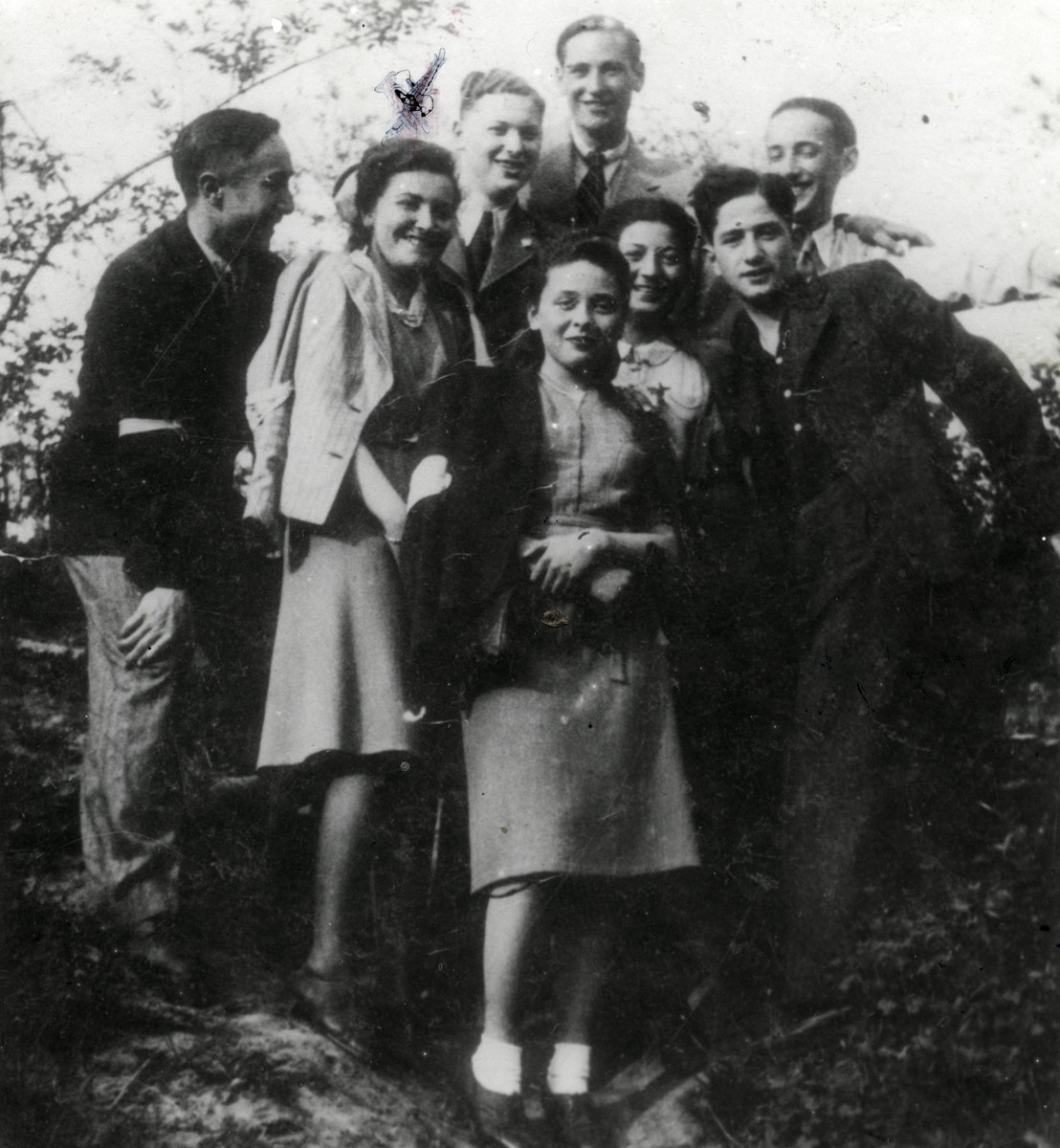 Group portrait of young people from a Zionist group in the Lublin ghetto.

Regina Fryd is pictured second from the left.  This photo was taken one year before she was murdered.  Also pictured are Stella Rubinlicht in front and her husband in the back, center.