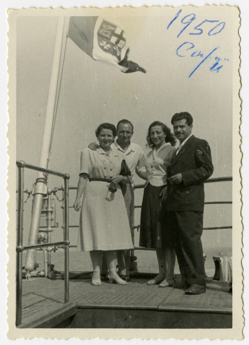 Clara and David Levy pose on board S.S. "General Hershey" while en route to the United States. 

They arrived in New York on September 12, 1950 on the eve of Rosh Hashanah.