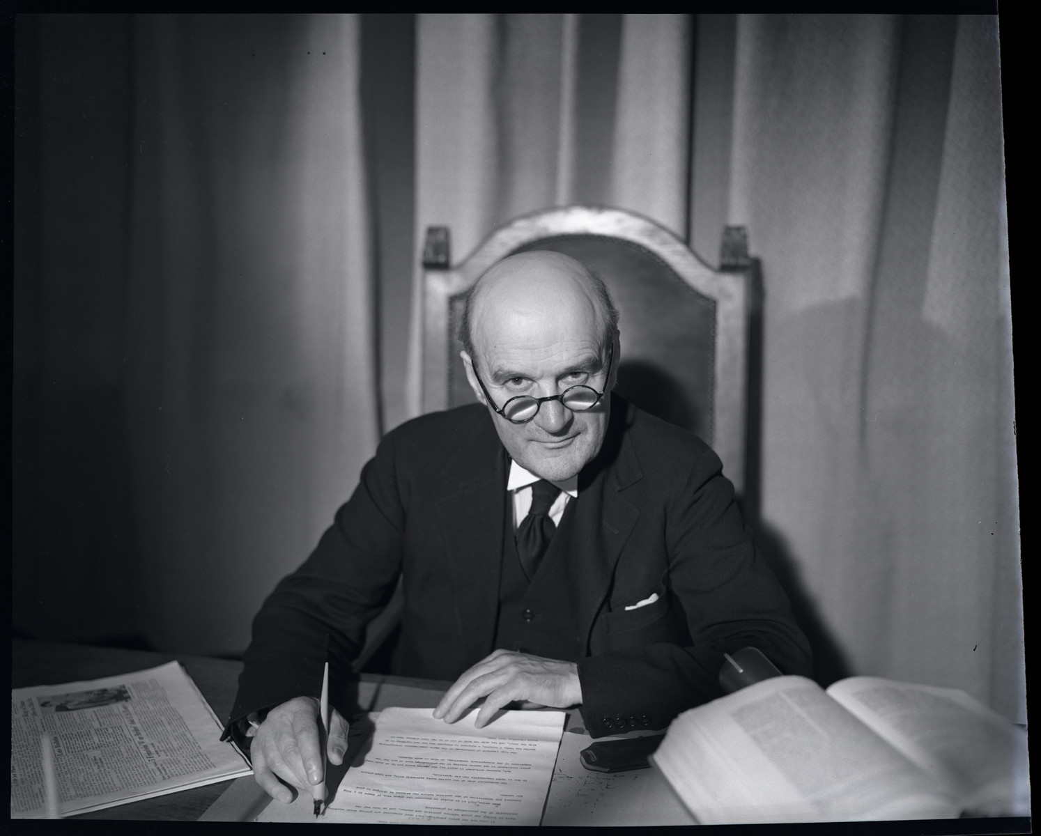 Close-up photograph of tribunal member Lord Justice Geoffrey Lawrence.