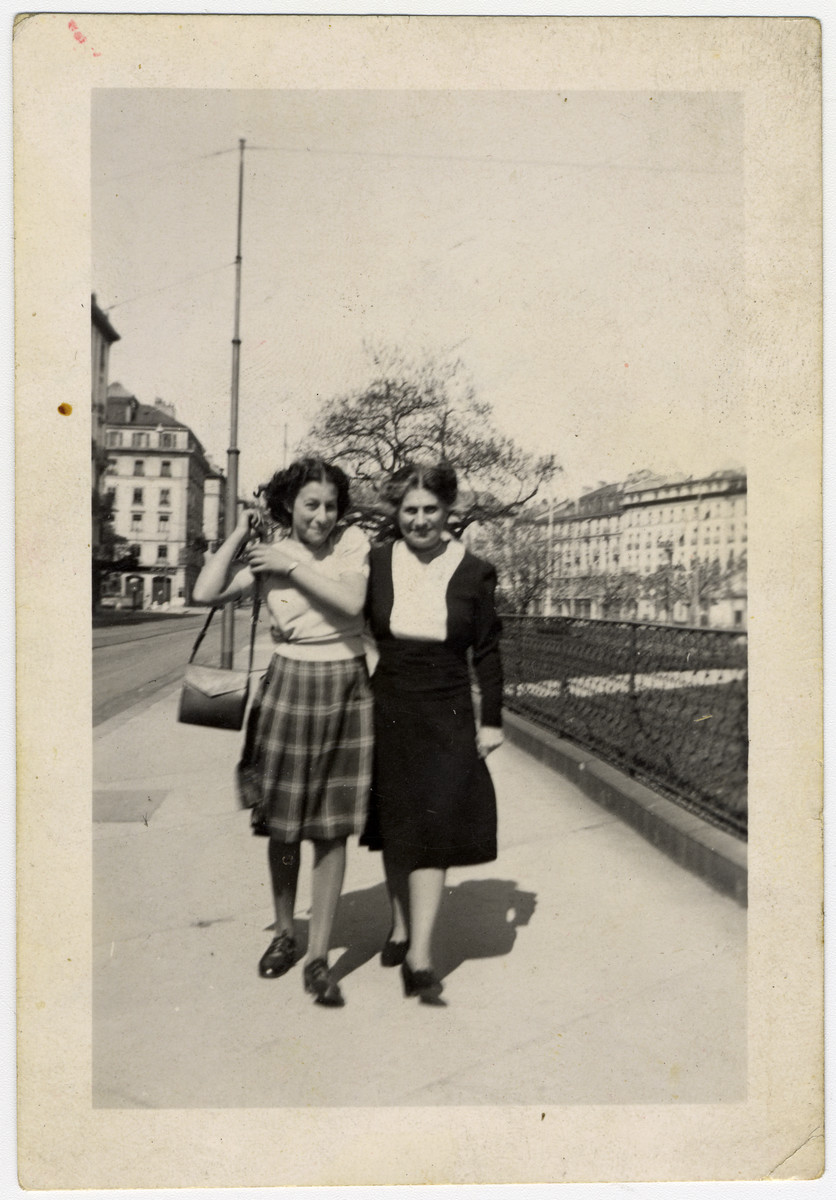 Ruth Schwarzhaupt, while on a brief visit to her cousin and friend Maria Klauber, walks down the sidewalk in Geneva with her.
