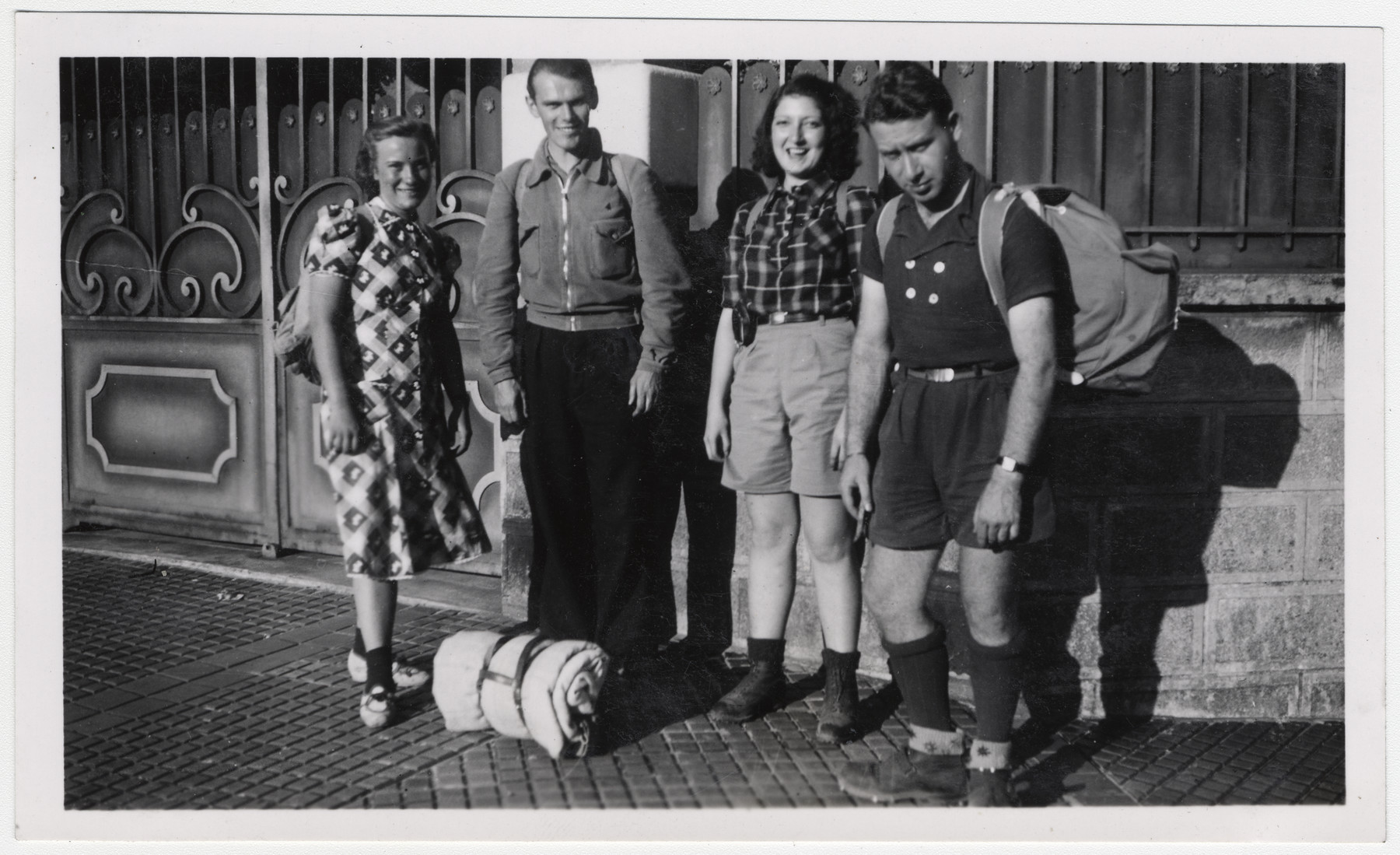 Four young people pose together with their backpacks and sleeping bags.  

Henri Moskow is pictured on the far right.