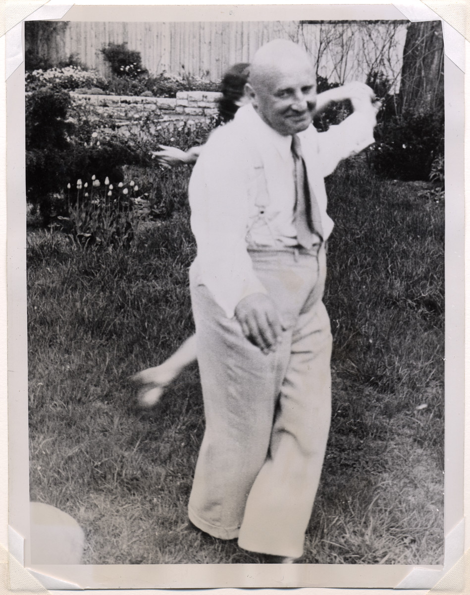 Julius Streicher dances outside with an unidentified woman.