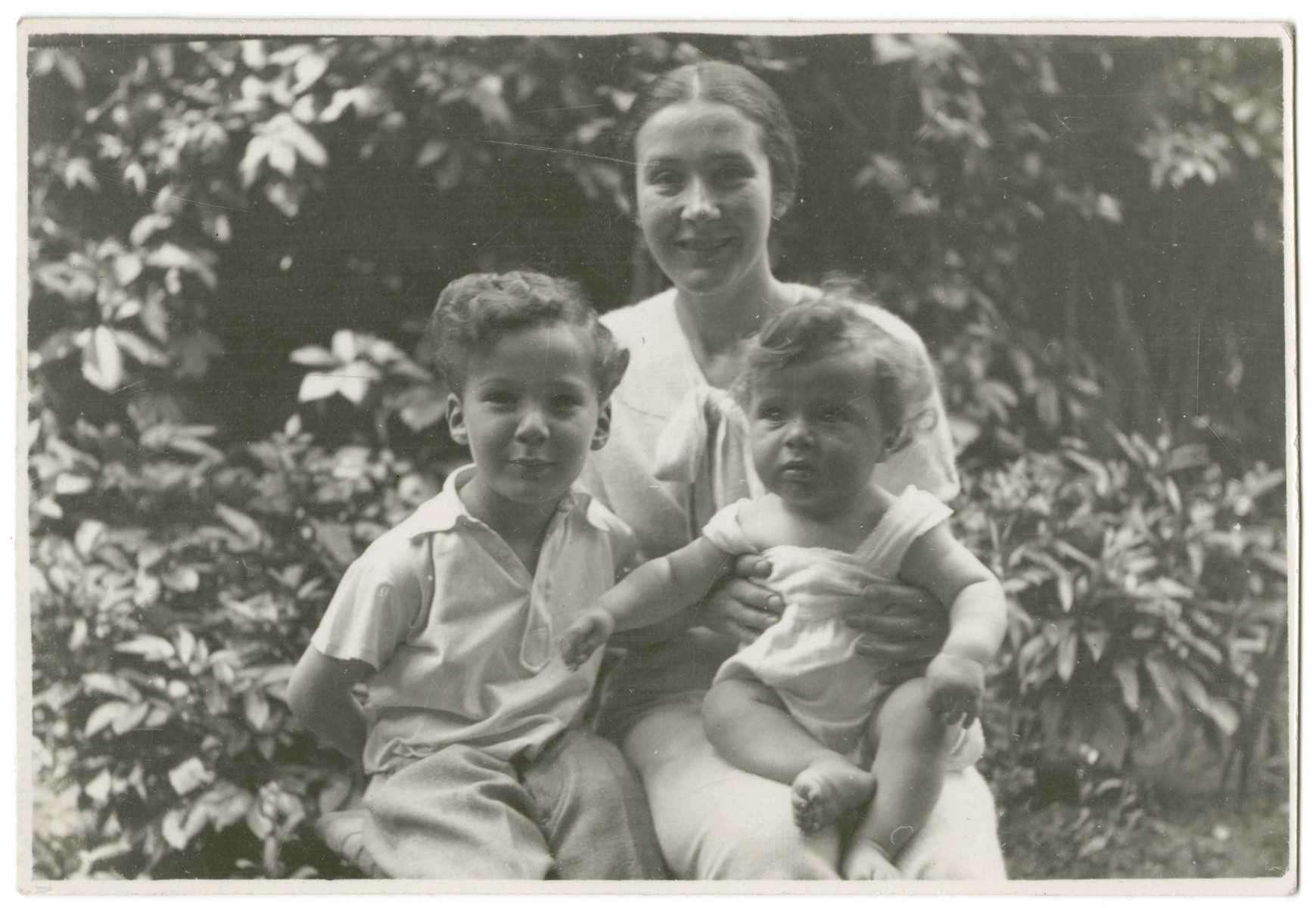 Vilma Grunwald poses with her two sons, John and Misa.