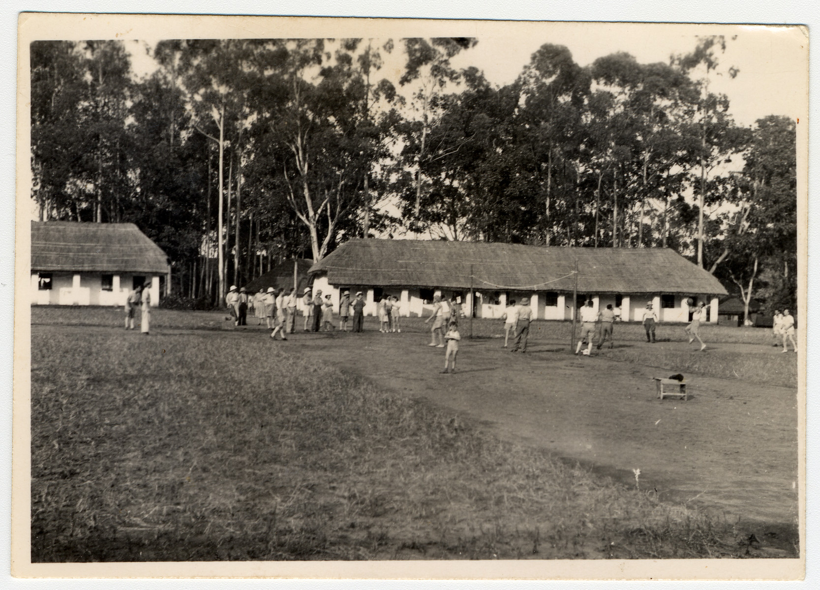 Internees play a sport on a grassy field in the internment camp for enemy aliens in Nyasaland.