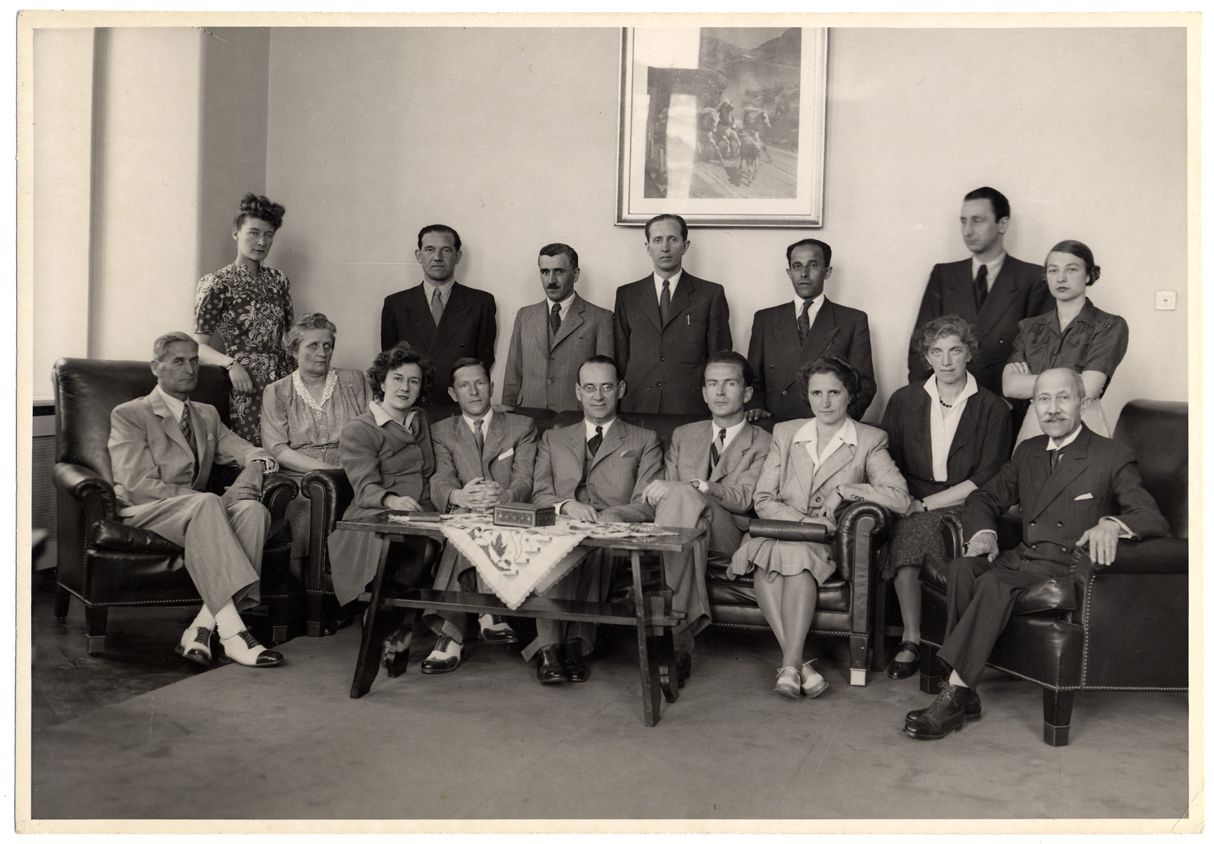 Group portrait of the Swiss consulate staff in Budapest.  Seated in the center is the Consul General, Carl Lutz.

Standing behind Mr.Lutz is his chauffeur Charles Szluha.
Seated on the left is Mr. Steiner.