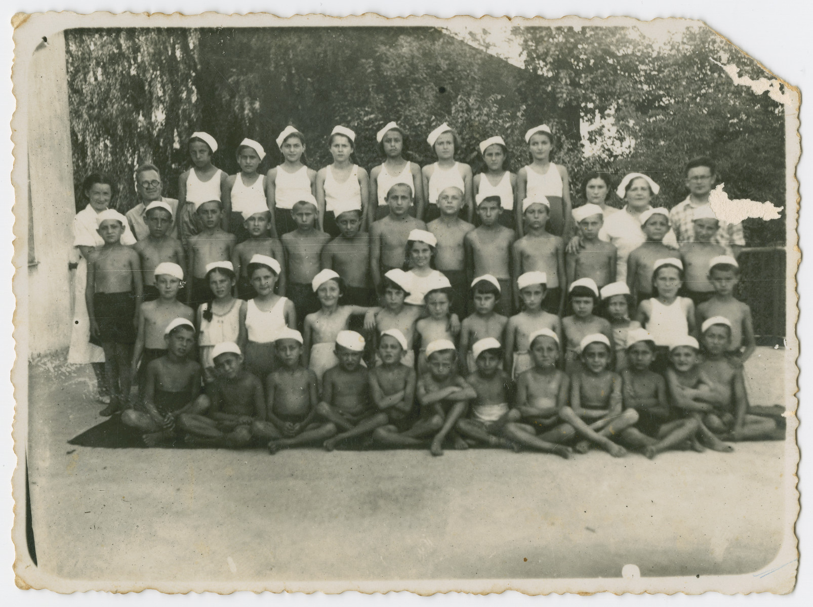 Group portrait of children in a T.O.Z. summer camp in the summer of 1940, 

Bella Preskovsky attended the. summer camp in Bialystok and was treated there as a "celebrity" from Palestine. Many of the children depicted in the photograph were deported from the Bialystok ghetto to Theresienstadt in 1943.