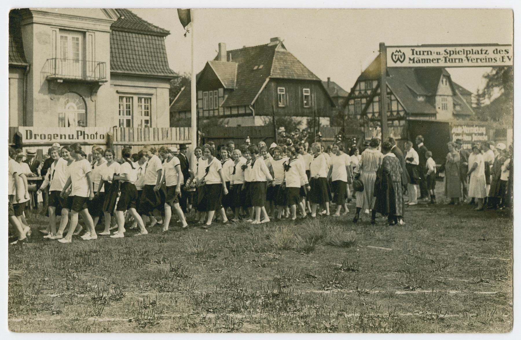 Girls march in a sports day celebration in Wolfenbuettel.