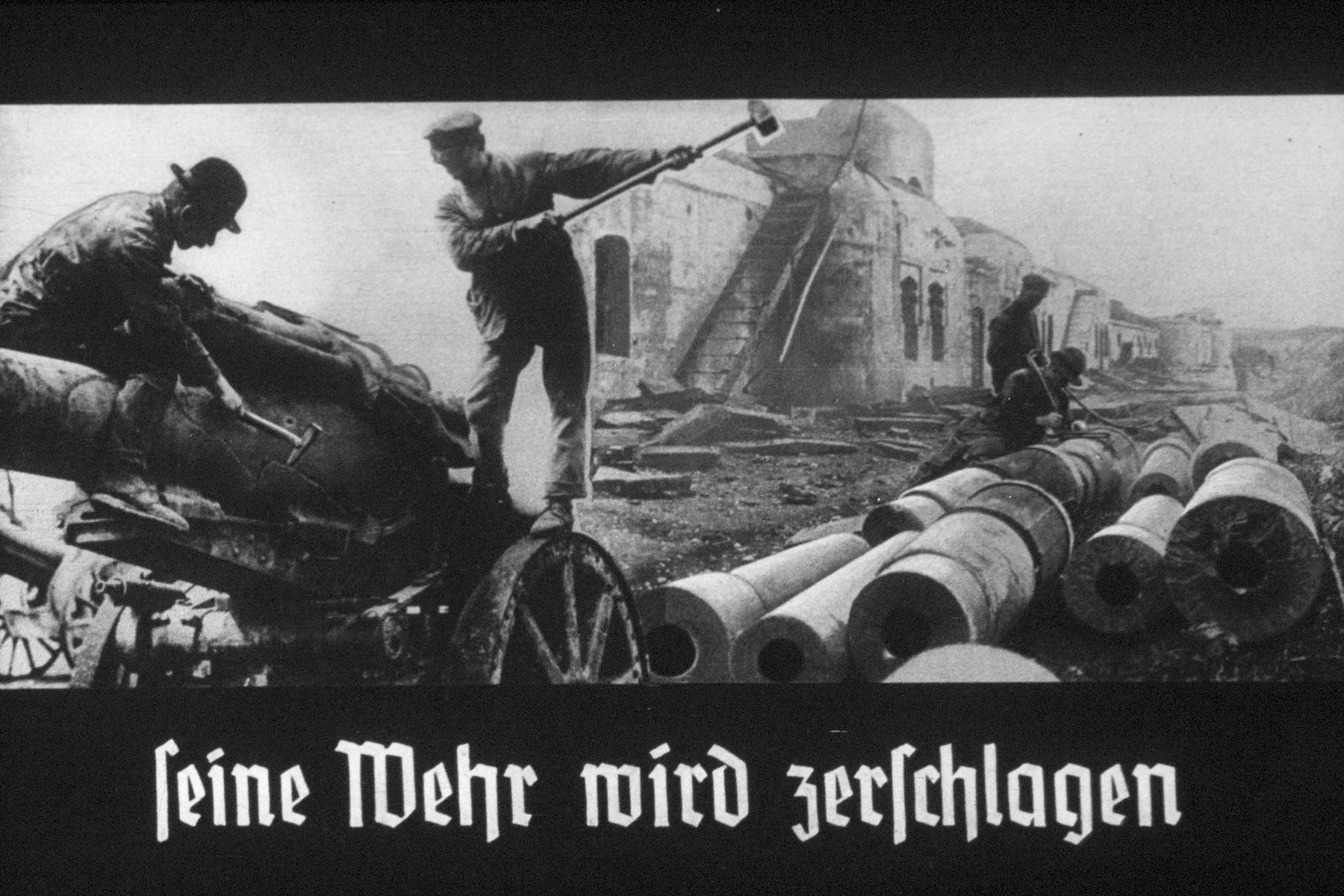 30th slide slide from a Hitler Youth slideshow about the aftermath of WWI, Versailles, how it was overcome and the rise of Nazism.

Seine Wehr wird zerschlagen
//
His defense is broken