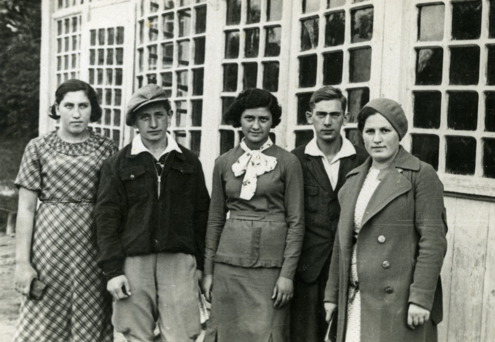 Group portrait of members of Hashomer Hatzair in Kielce.

From left to right are Dina Itskovic, Nachum Finkelstein, Sara Laks, Chaim Leichter and Sara Golemblowski.