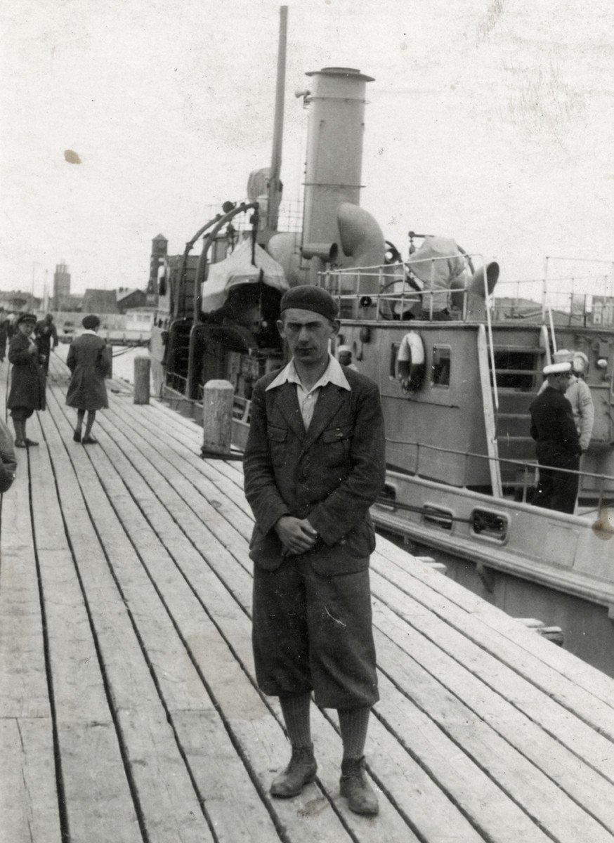 Chaim Leichter stands on a pier while on an excursion with his school to Gdansk
