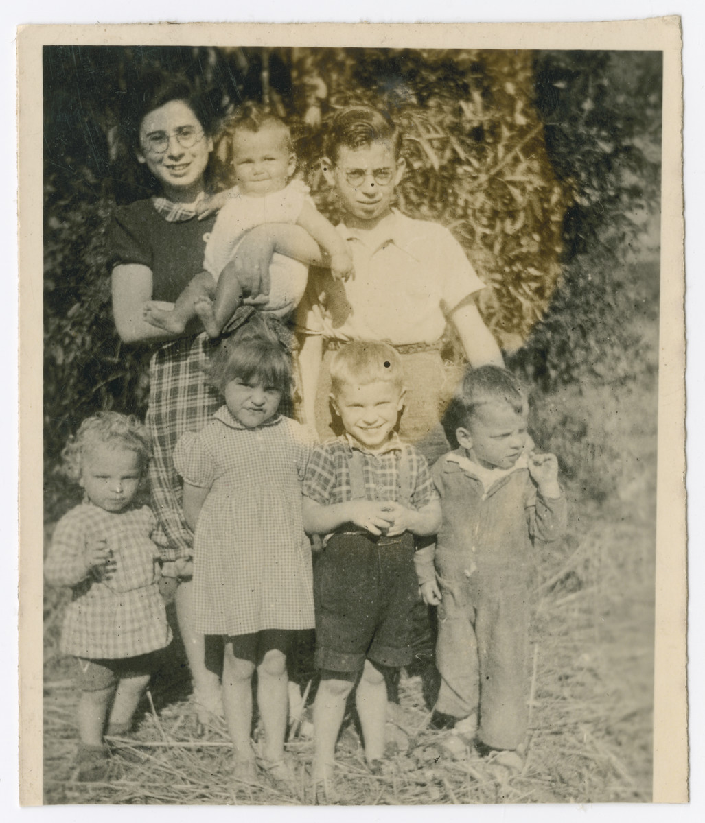 Jewish children hidden by the Wijnakkers pose with their rescuers' children right after liberation.

Pictured in the back are Shula (Freetje) Laub holding Ineke Baars and her brother Avraham (Fritsje) Laub.  In front are the four Wijnakker children: Frans Jr., Nellie, Thijs, and Jan.