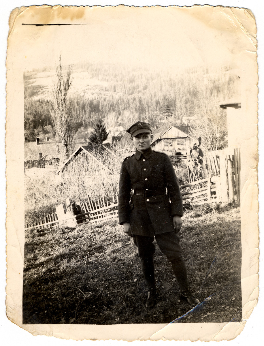 Abraham Samoszul stands outside in his Polish uniform.

He was born in 1916 and killed in Treblinka at the age of 26.