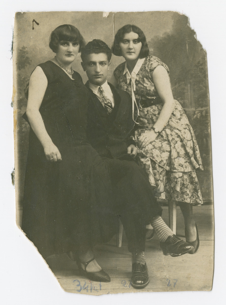 Gita (left) and Mendel Kuperman pose with Rivka Rubinzon, Gita's sister, for a portrait.
