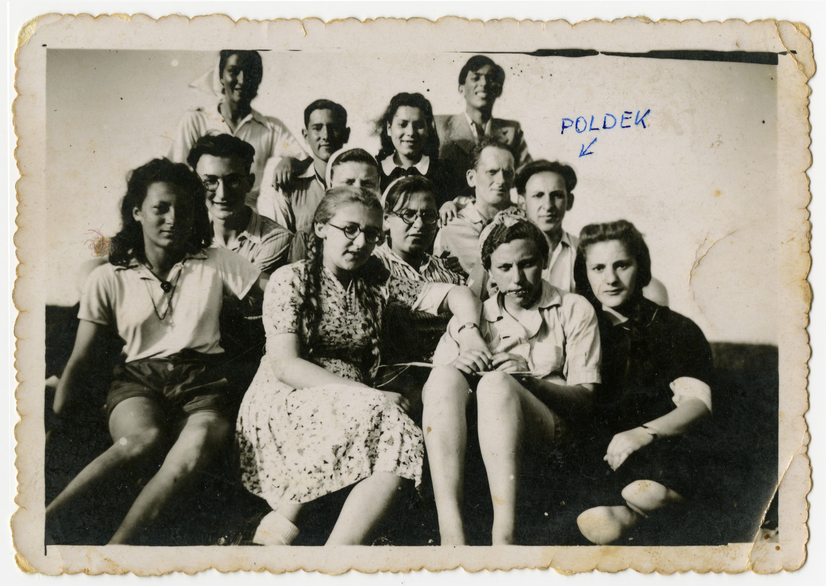 Group portrait of Zionist youth in "Farma."

The "Farma" was a plot of land between Bedzin and Sosnowiec that was allocated to the local Zionist youth movements by the Jewish Council for the growing of vegetables. The youth movements created a hachshara on the site. Soon after, the "Farma" became the center of resistance efforts, as well as youth activity, in the ghetto.