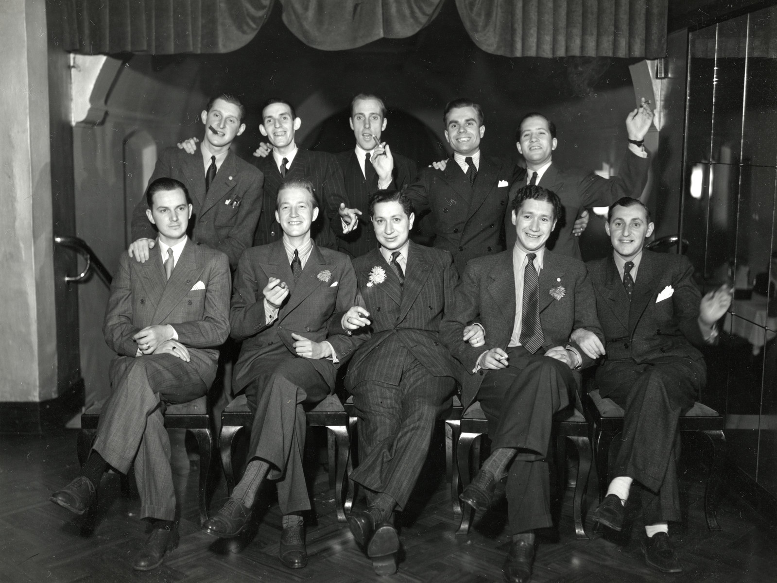 Group portrait of the members of the Judiska Ungdon, the Jewish social club in Malmo.

Elias Feigen is pictured in the front center.  His brother Bertil is to his right.  Hans Silver is seated on the far right.  Lennard Silwert is standing on the left.