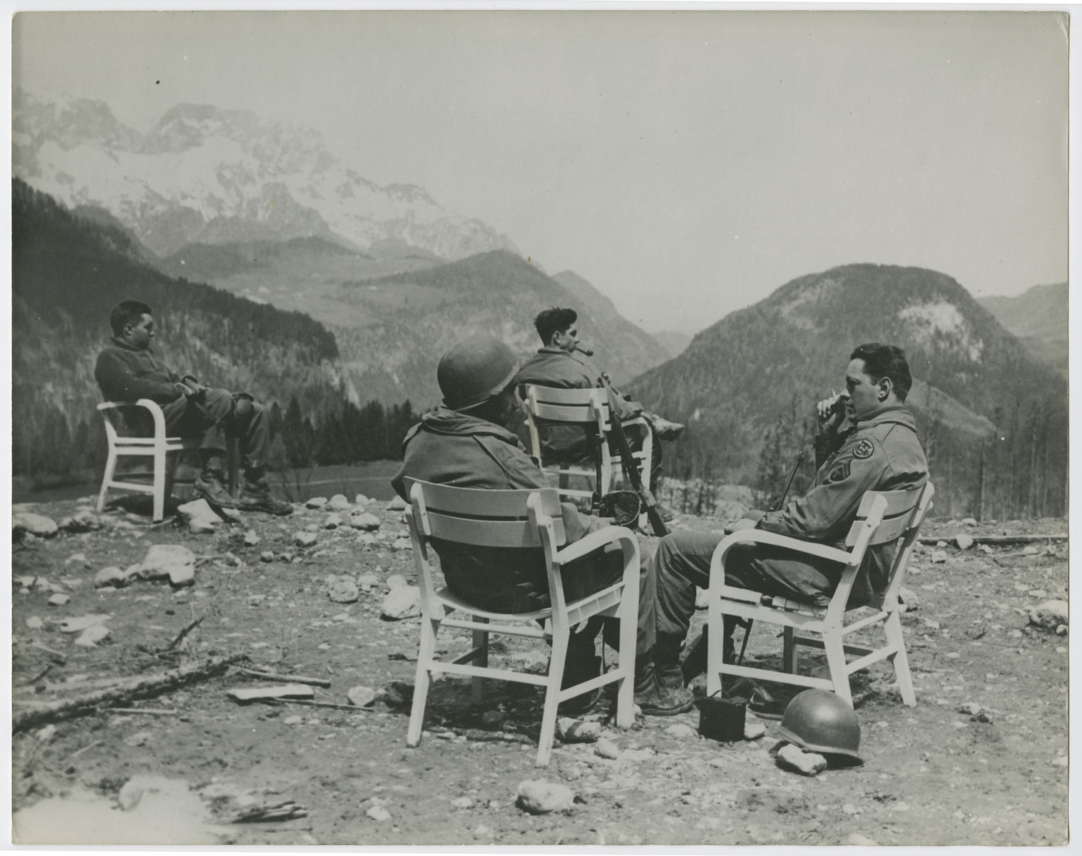 Five soliders of the Seventh U.S. Army visit the former mountain retreat of Adolf Hitler in the Berchtesgaden on the first day of peace in Europe.