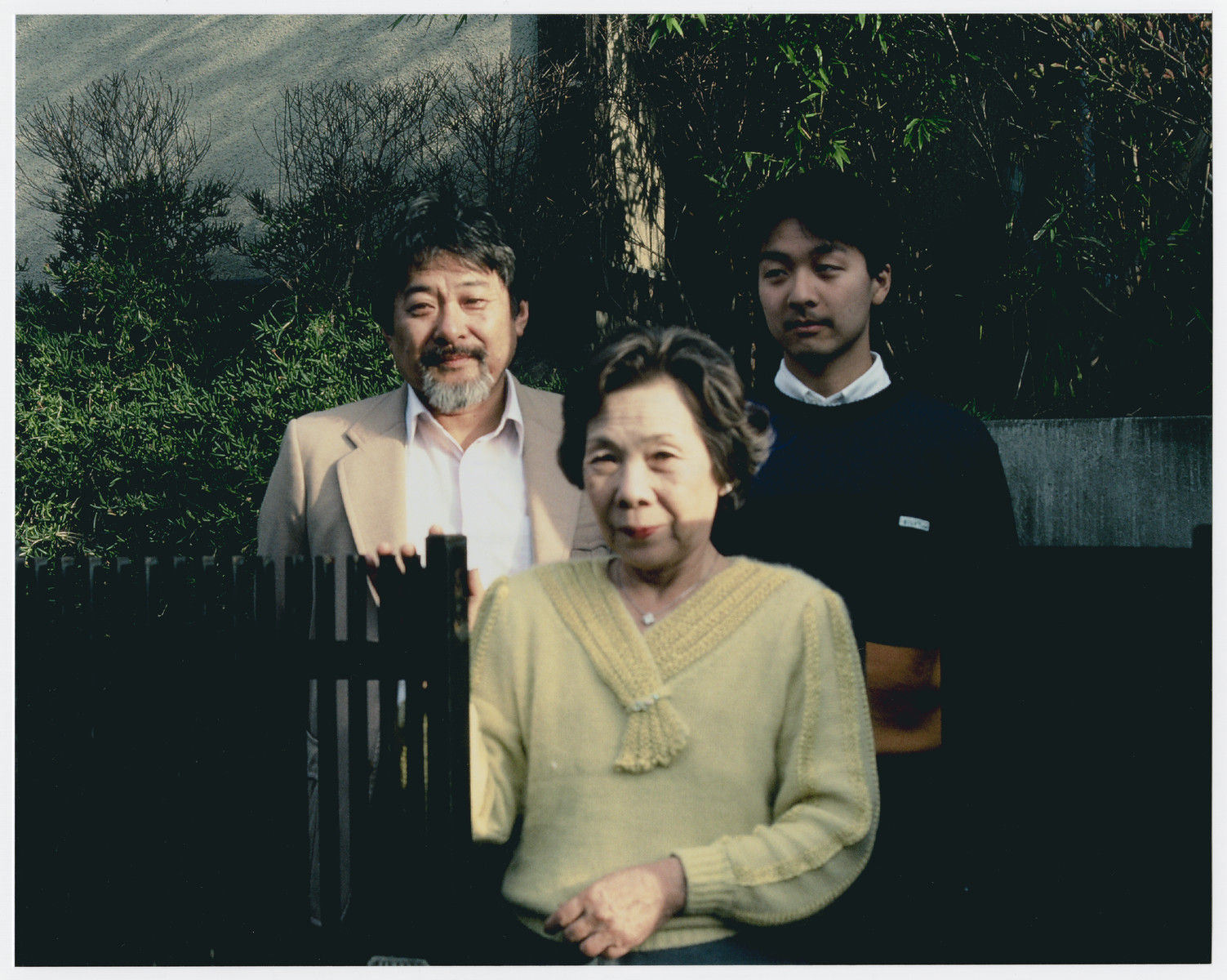 Yukiko Sugihara poses with her son Hiroki and grandson,