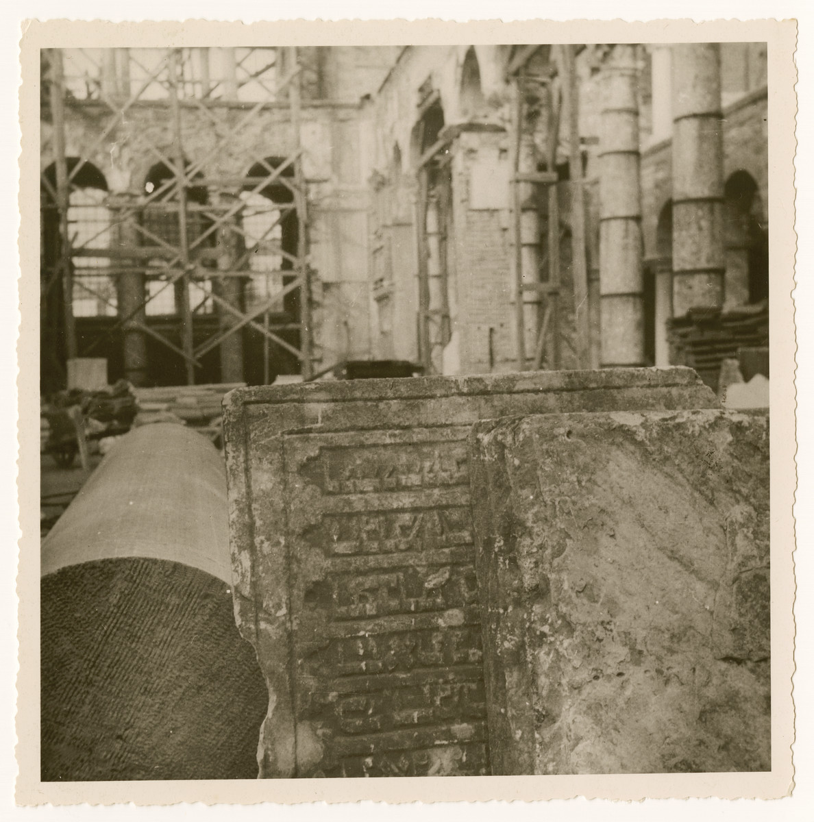 Postwar view of a church in Salonika constructed in part from Jewish tombstones.

The original caption reads "Tombstones taken by Greeks for part of church."