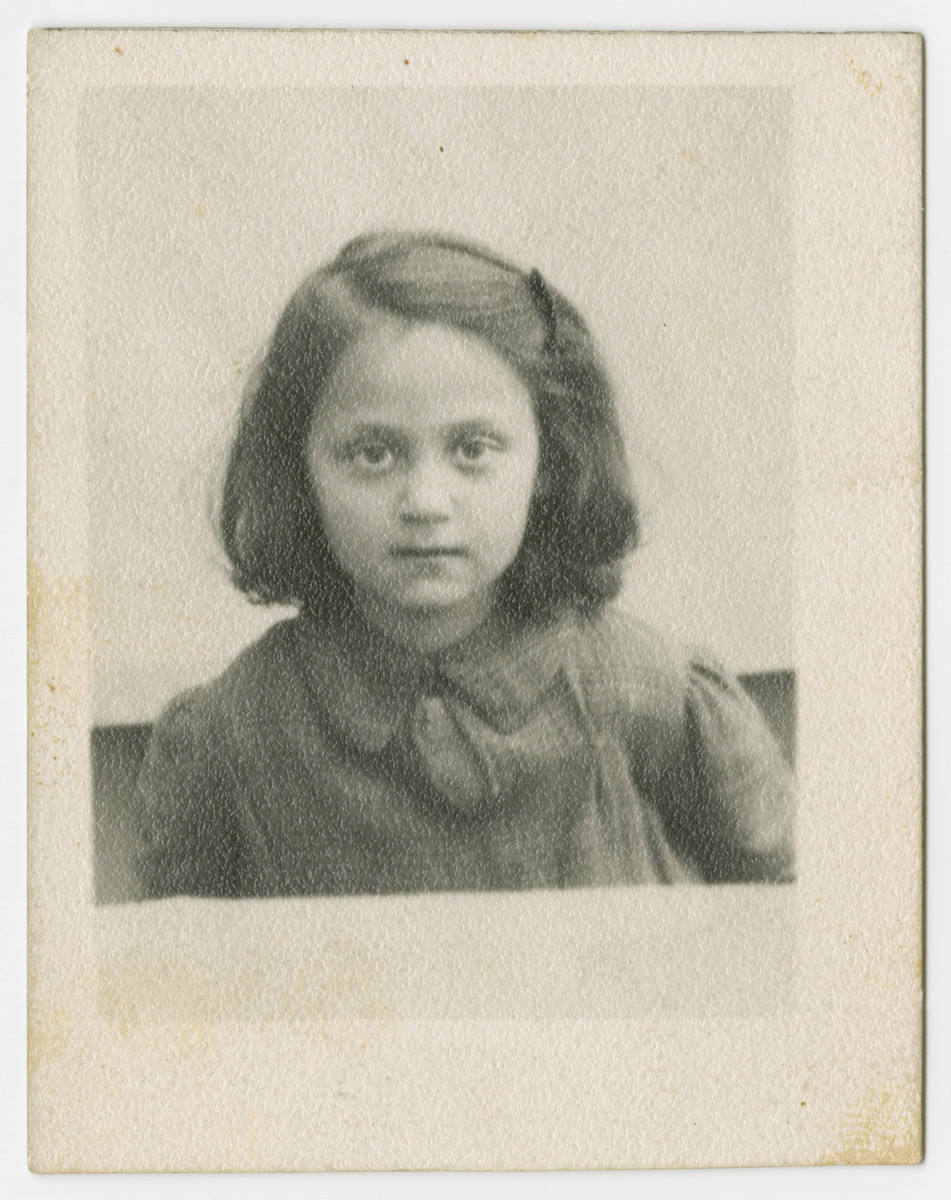 Close-up portrait of Anna Roth in the Bochnia ghetto taken by a Jewish photographer whose own daughter was killed that same day and wanted a memory of a child in the ghetto.