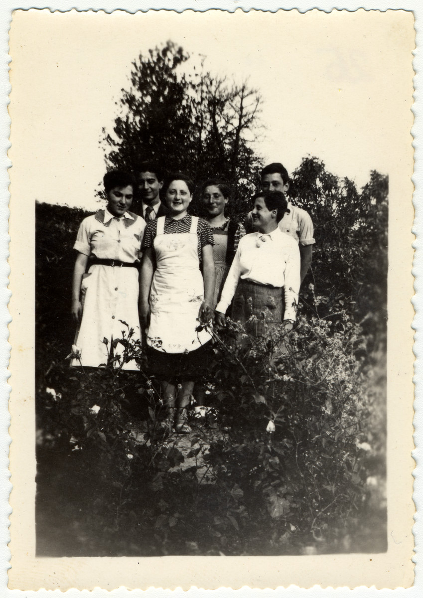 A group of young people pose for a photograph at the children's home of Seyre.

From left to right: Ruth Schuetz, Werner Rindsberg, Inge Vogelstein, Lotte Nussbaum and Almuth Koenigshoefer. Behind her Walter Strauss.