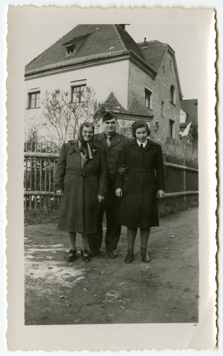 Miriam Elkes poses with her brother Hans Malbin and her daughter Sarah in the Saint Ottilien displaced persons camp.