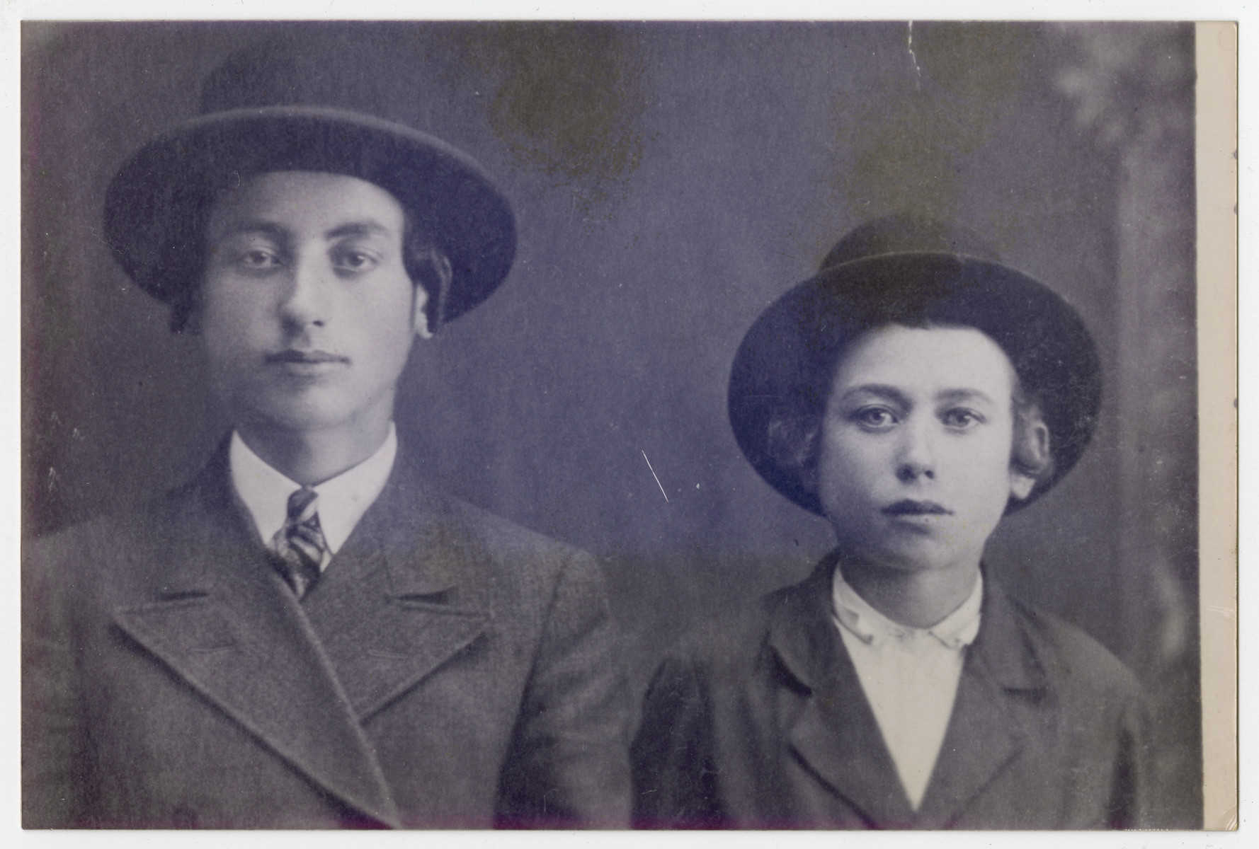Studio portrait of two yeshiva students, Abraham and  Zwi Hersh (Hessi) Weiss, brothers of the donor.