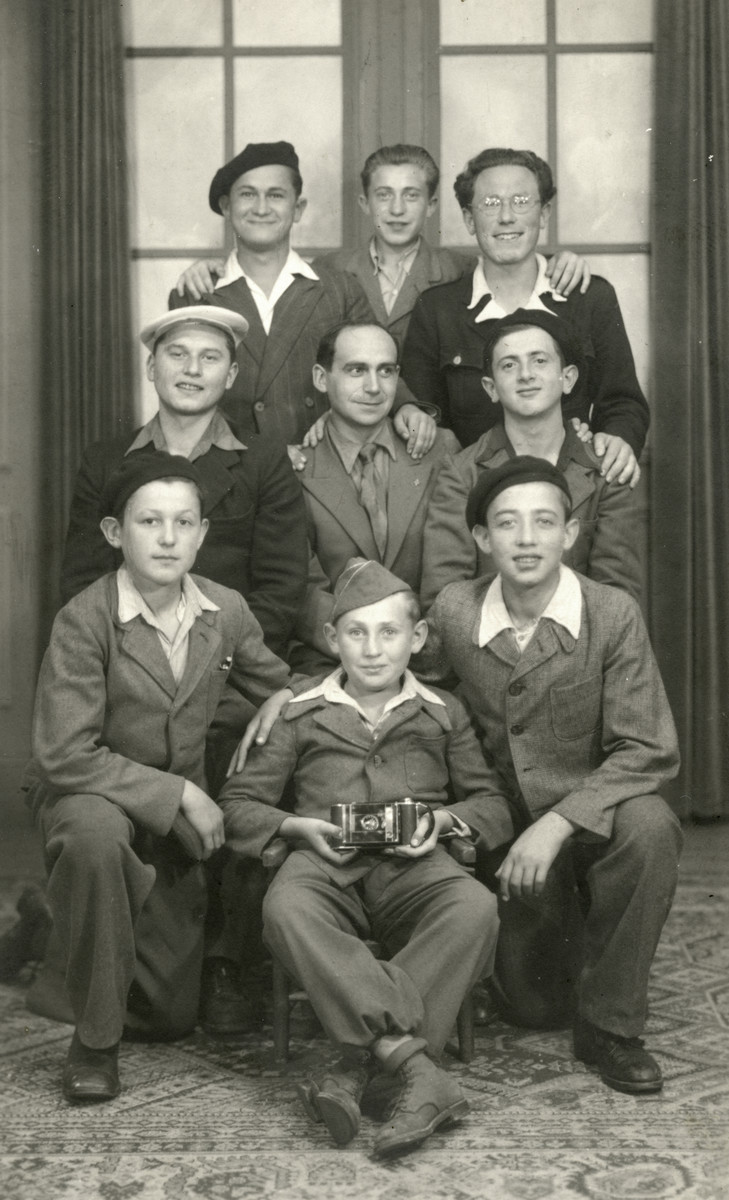Group portrait of boys in the Ambloy children's home.

Jakob Finkelstein is bottom middle.  Jacques Rybstzajn is bottom right.  Binem Wrzonski is second row, right.  The astronomy teacher is top right.