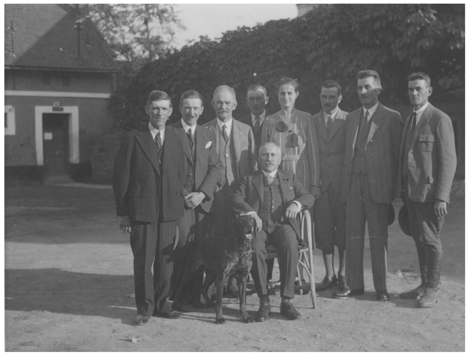 Julius Kraus poses with the employees of his farm.

His estate later became the site of the Lipa farm labor camp.  Karel Kraus is pictured second from the left.