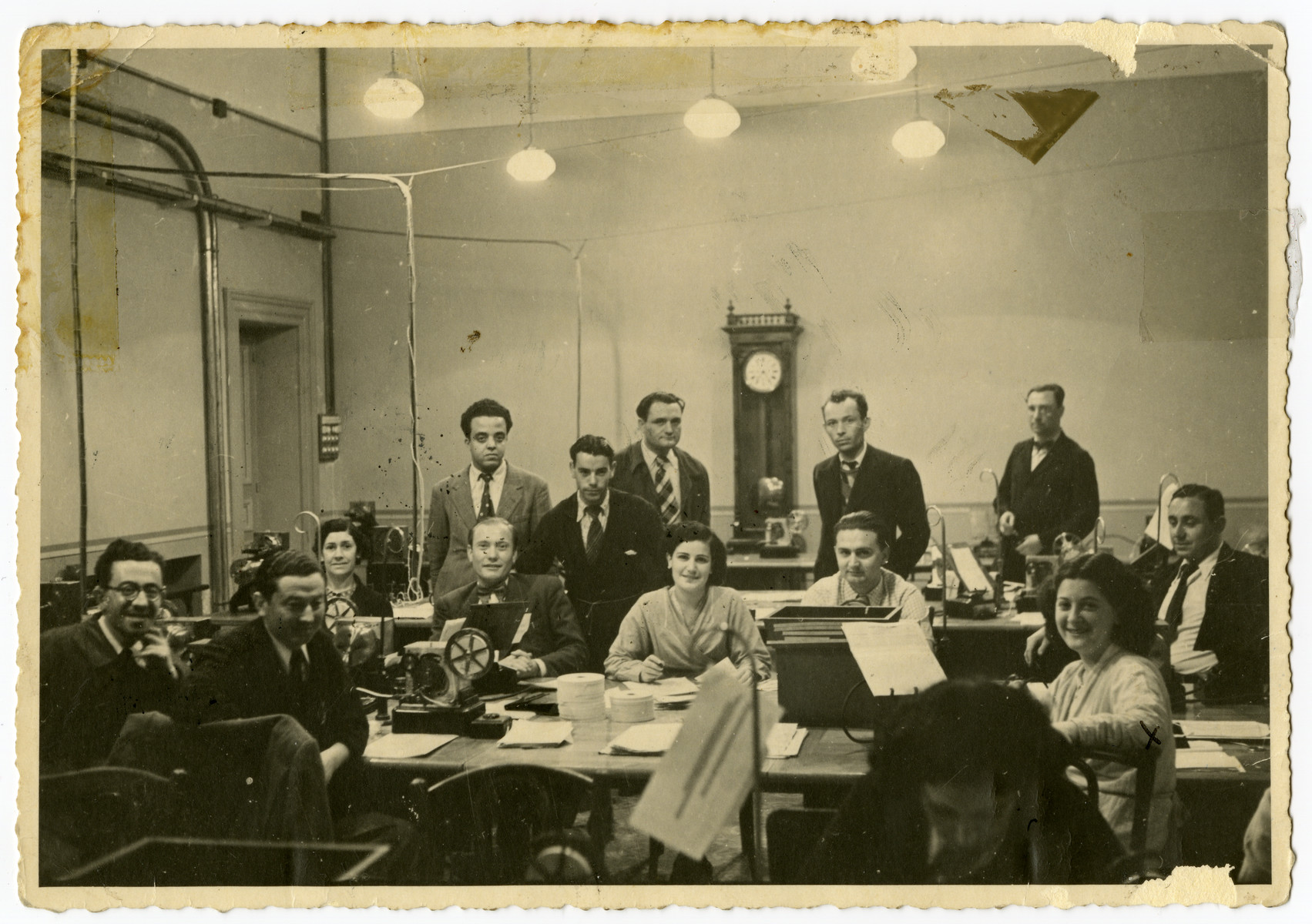 Workers of the Central Telegraph Office in Tunis operate their teletypes.

Arlette el Haik (later Benichou) is seated in the right hand corner.