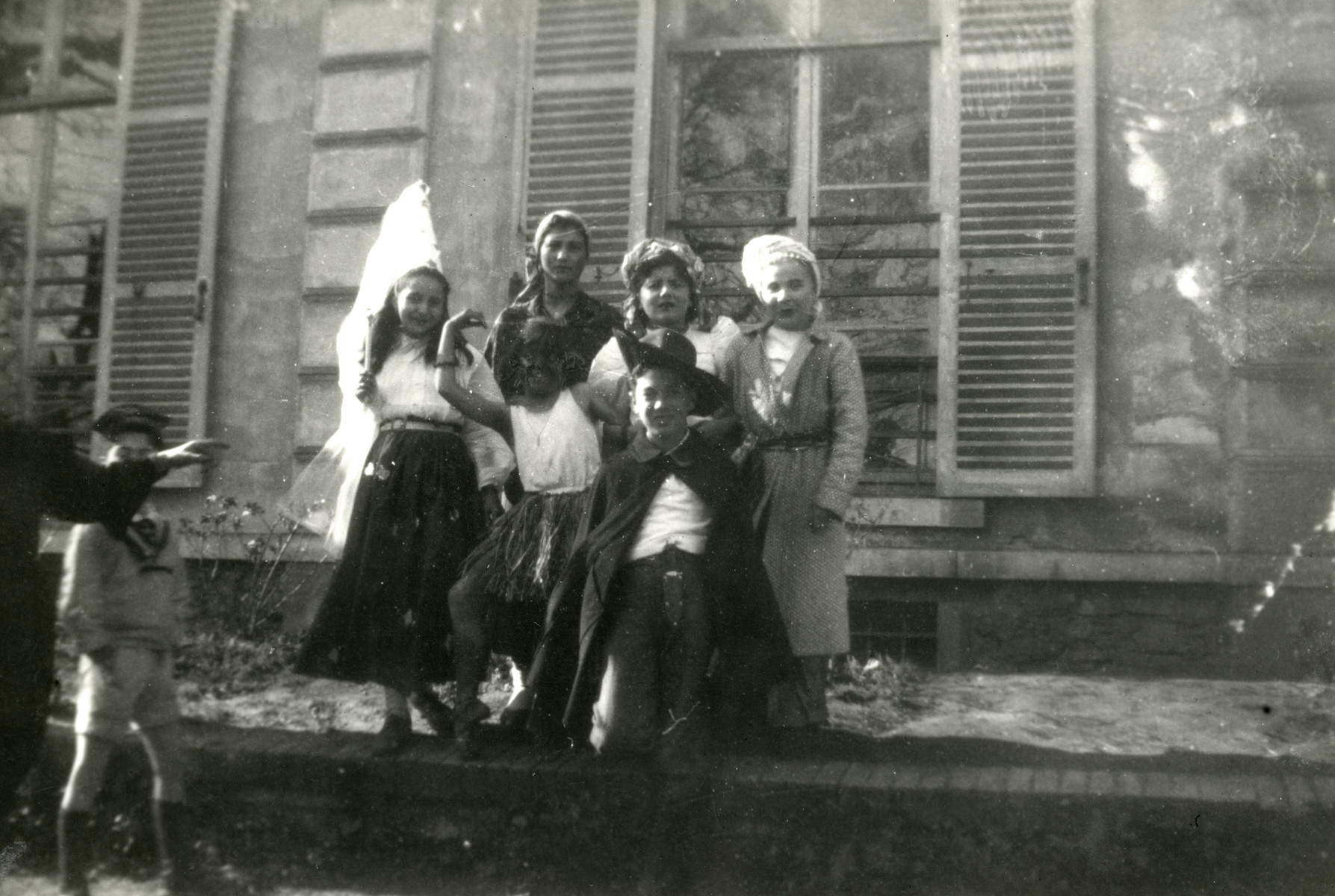 Children pose in their Purim costumes in the Taverny (Vaucelles) children's home.