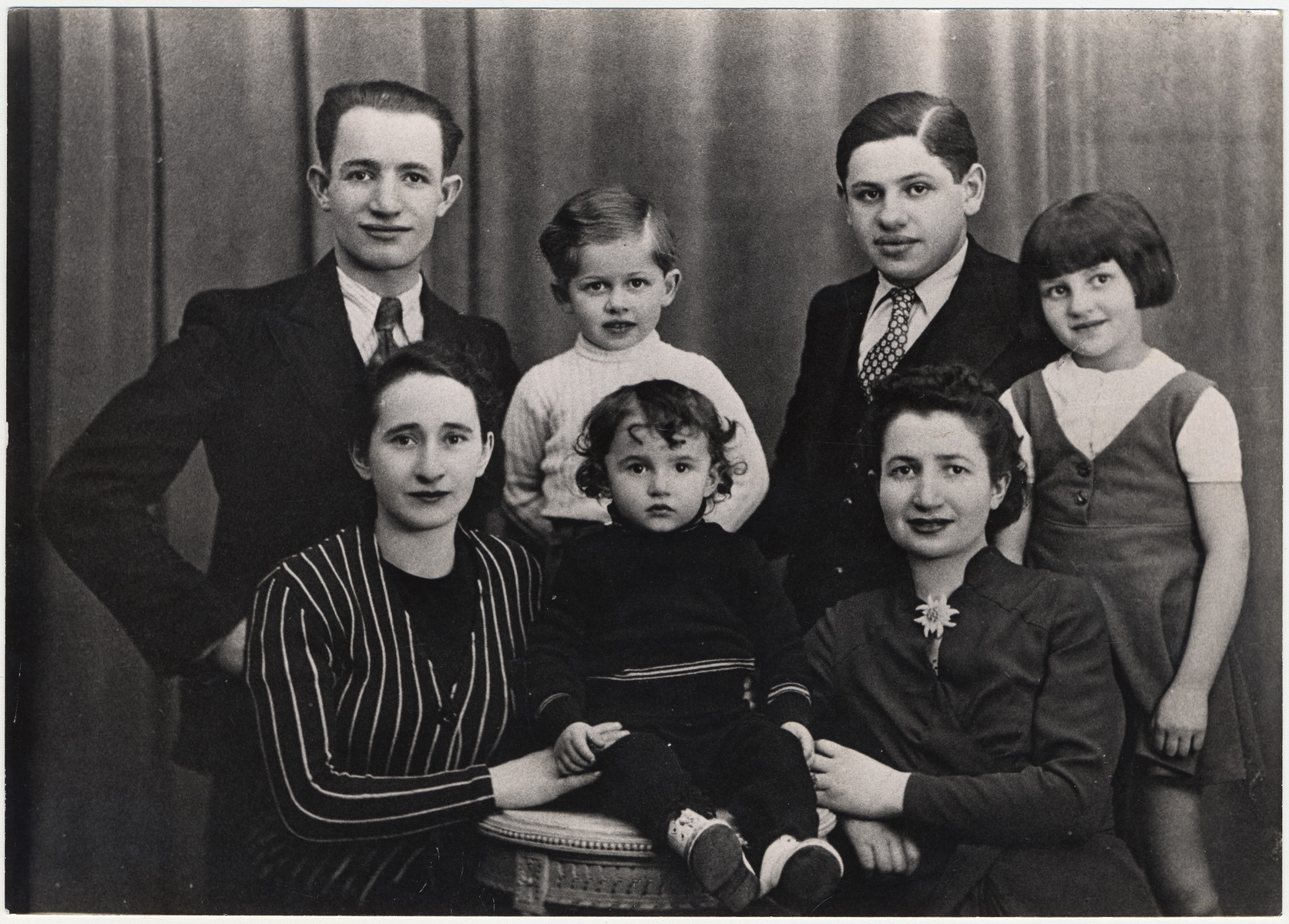Group portrait of the Karpik family taken shortly after the German invasion of France.

Pictured are Jacques Karpik, with his parents, Szmul and Rojza (nee Taszynowicz) Karpik (left).  Also pictured are his aunt Rivkah Wasserman, uncle Benzion Wasserman and cousin Sarah Wasserman (later Wojakowski).