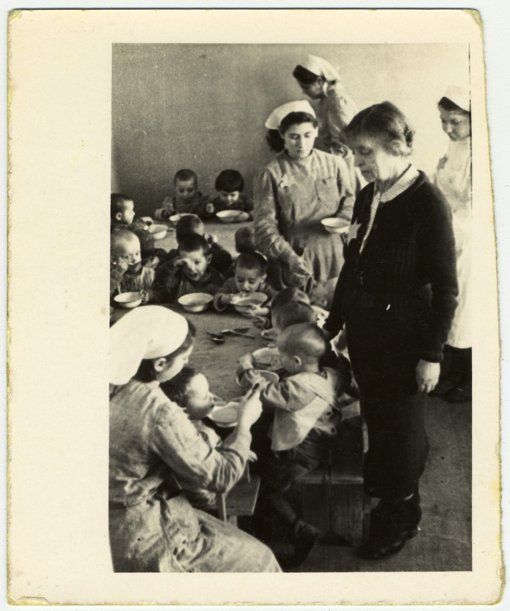 Children eat soup in the pediatrics ward of one of the hospitals in the Lodz ghetto.