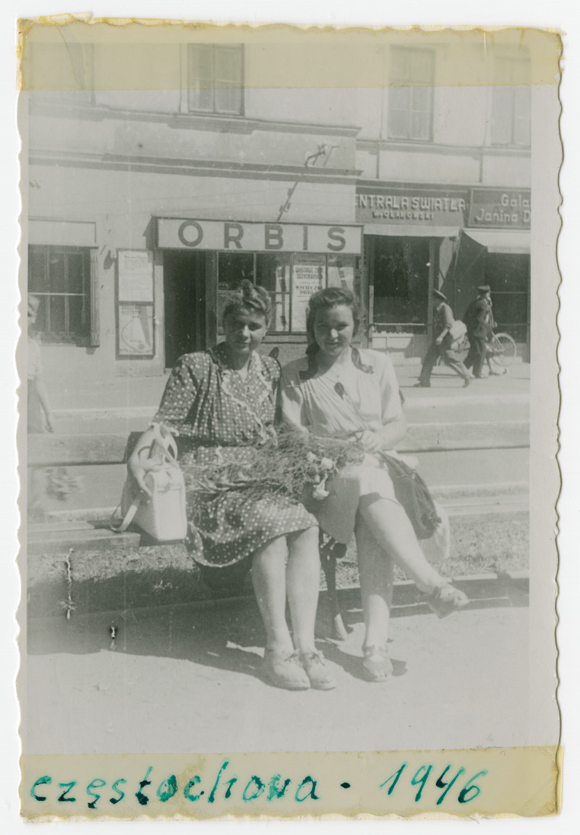 Danka Perelmuter (right) shares a bench with Zulka Bozek in postwar Czestochowa.
