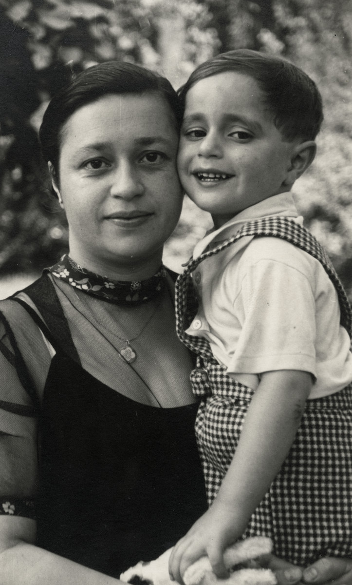 Esther Weeg poses holding her young son William.