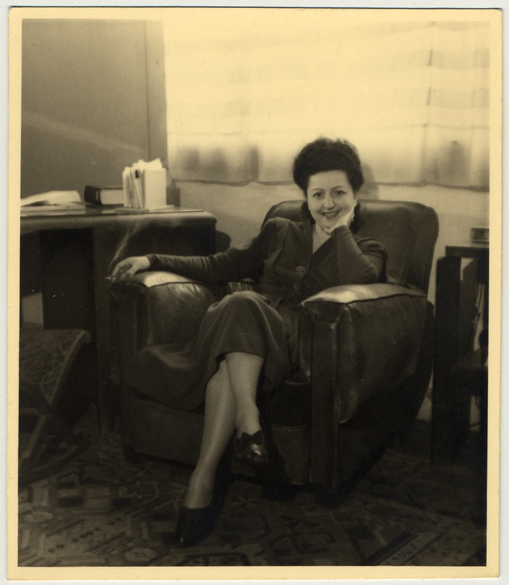 Postwar portrait of Jewish rescuer, Fela Perelman, sitting in an armchair.