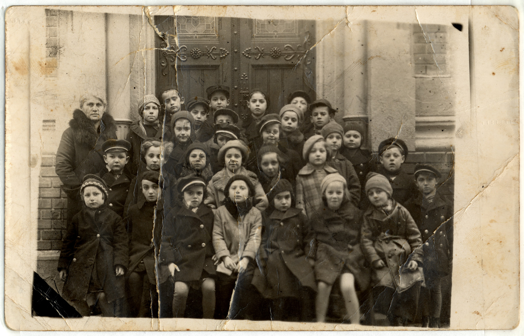 Children in the Jewish day school in Brasov which met in the Neolog synagogue.

GheorgheJozsef (the donor) is in the back center.  Joan Janosi is pictured in the third row.  (He later became a philosopher and member of the Romanian Academy.)
