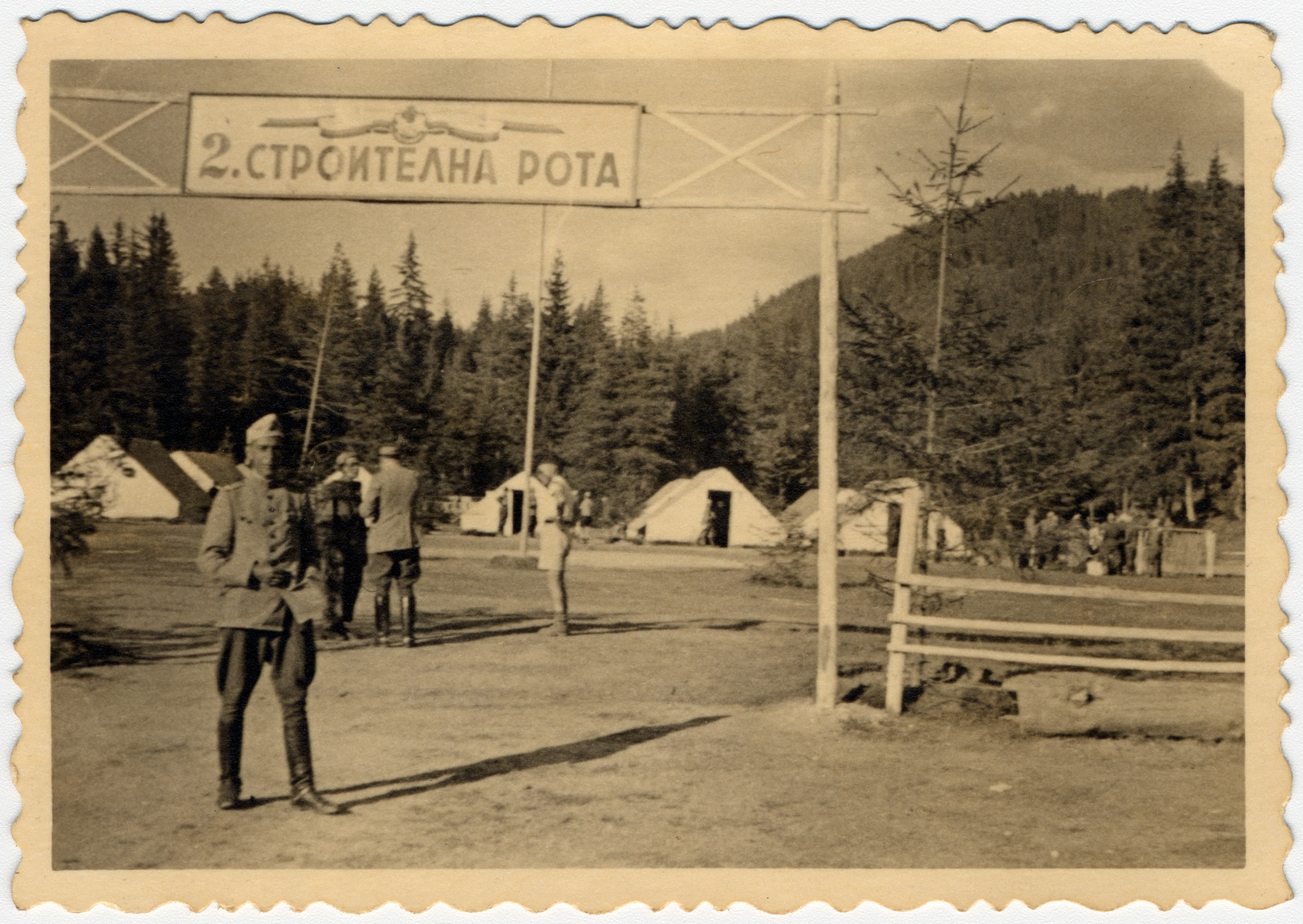 View of the entrance to the 2nd Constuction Company labor battalion in Bulgaria.

Standing in front is Avramoff
