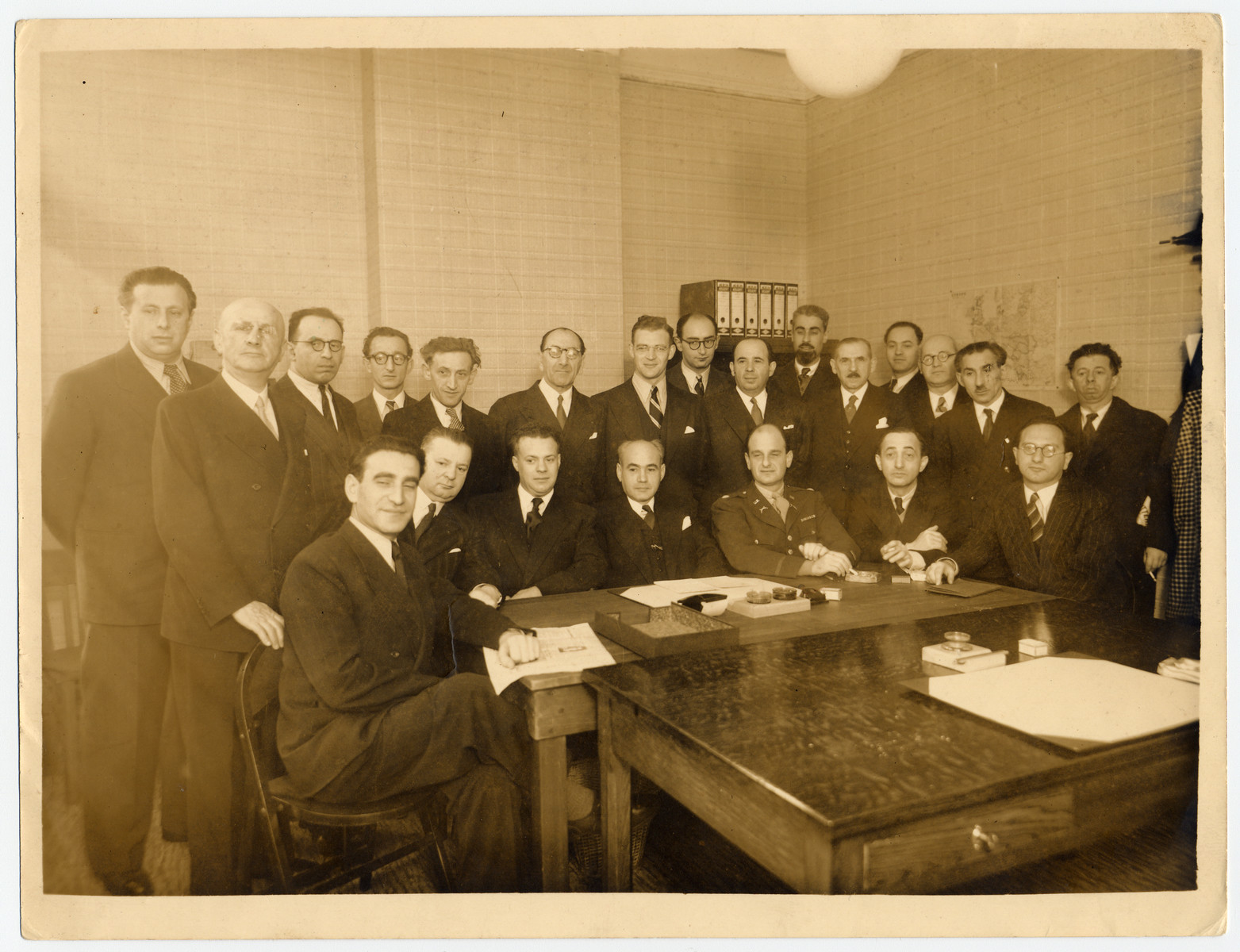 Members of the Belgian Jewish resistance meet with members of the Joint Distribution Committee after the war.

Chaim Perelman is seated in the front row on the right.  Abusz Werber is in the front row on the left.  Fucks is seated third from the left.  Aaron Dorf is standing fifth from the left and Israel Tabakman is standing second from the right.