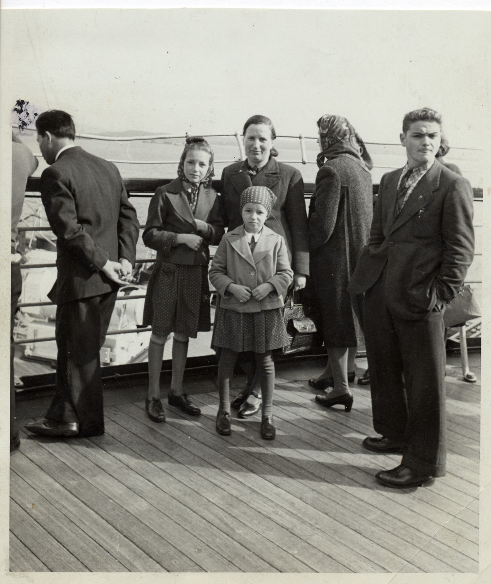 A Deaf Austrian Jewish family on board the "SS Rex," en route from Genoa to New York.

Among those pictured are Hilda Wiener Rattner (center) and her daughters Nelly (left) and Lilly (right).