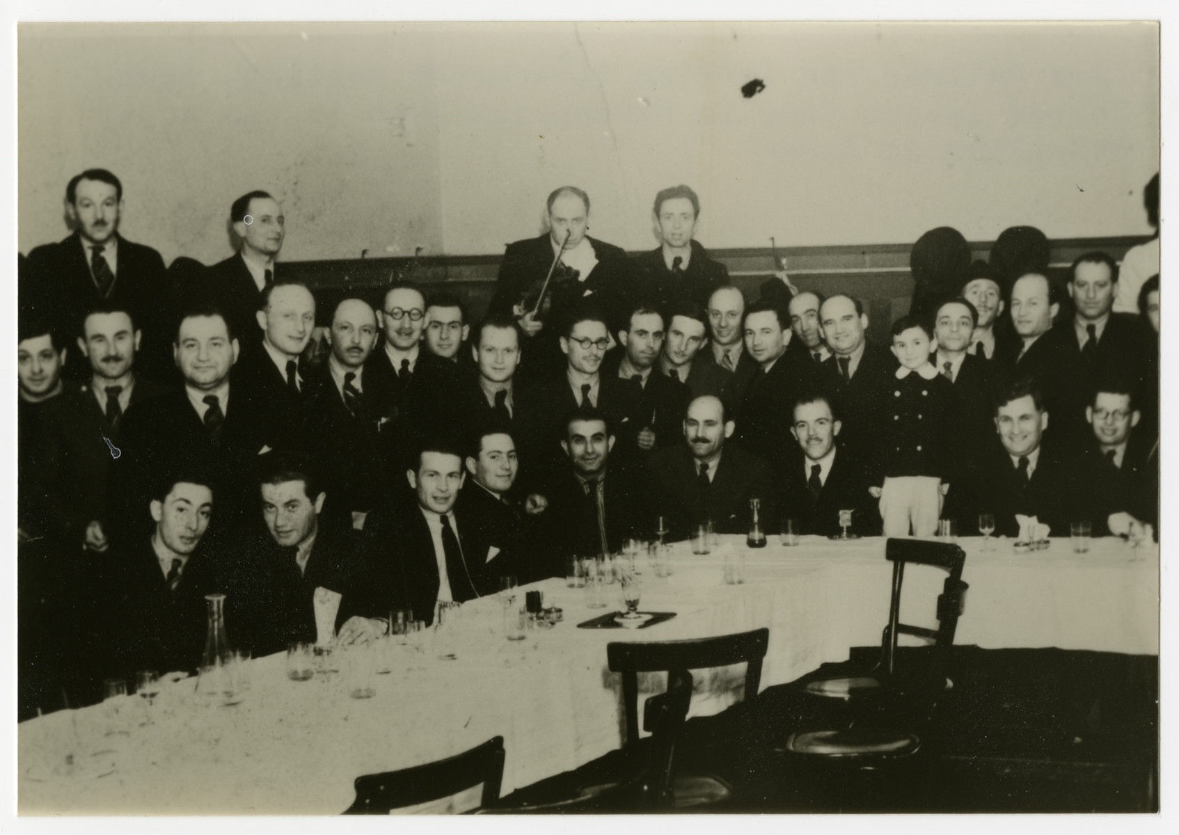Hungarian Jewish men who had served together in the Sarospatak labor camp gather for a meeting at the Hotel Schalkhaz in Kosice.

Alex Gellman is pictured in the middle row, second from the left.